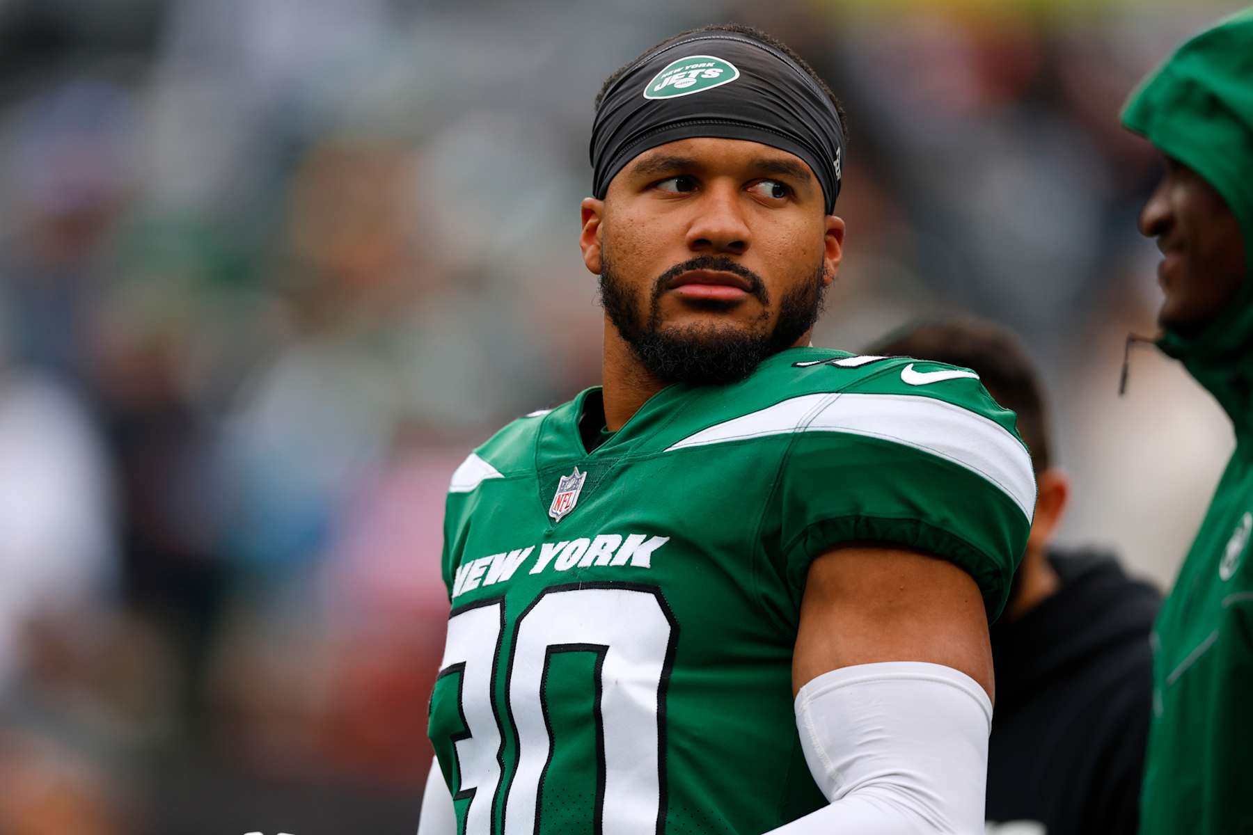 EAST RUTHERFORD, NEW JERSEY - DECEMBER 24: Michael Carter II #30 of the New York Jets before a game against the Washington Commanders at MetLife Stadium on December 24, 2023 in East Rutherford, New Jersey. (Photo by Rich Schultz/Getty Images)