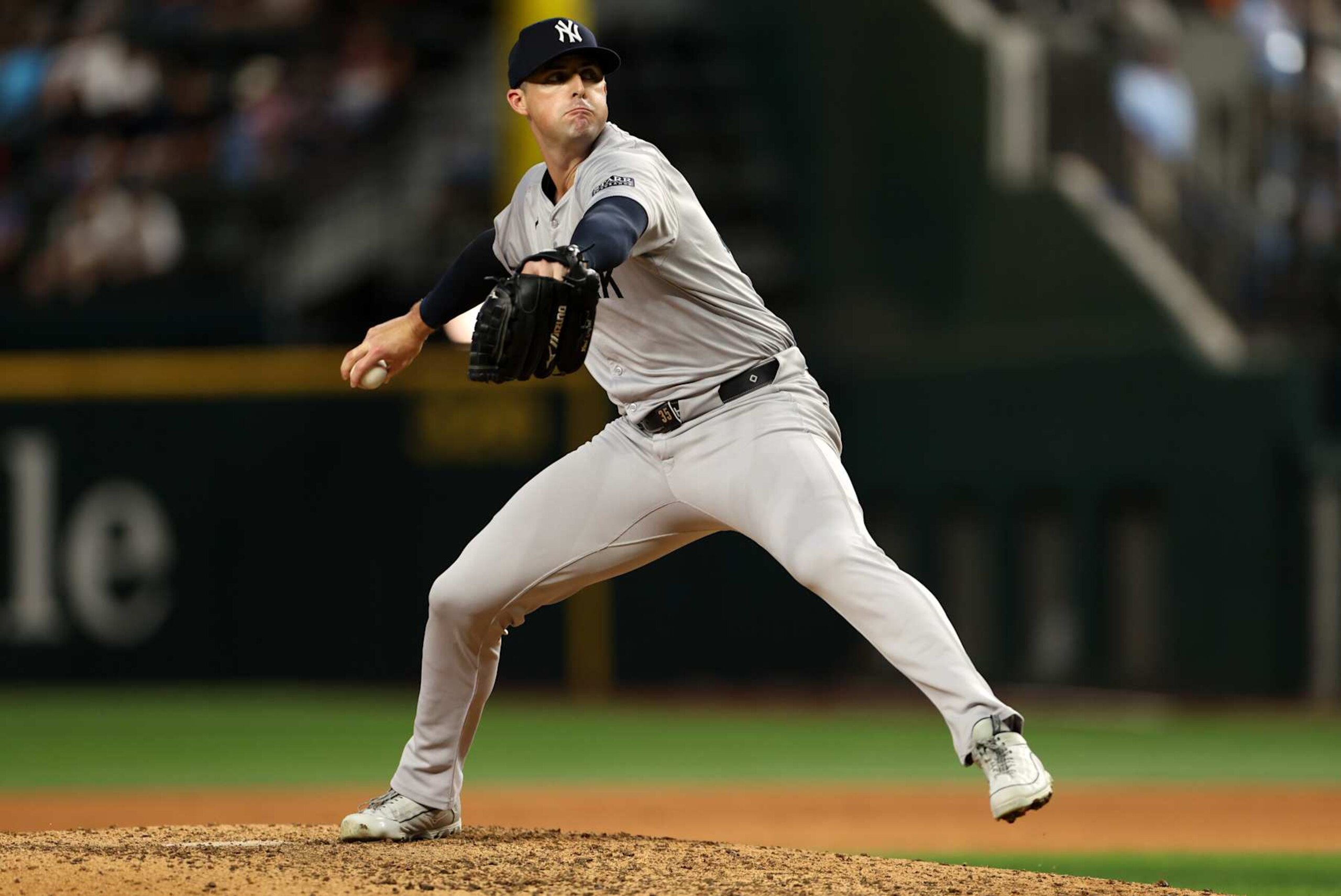 ARLINGTON, TX - SEPTEMBER 2: Clay Holmes #35 of the New York Yankees pitches against the Texas Rangers in the ninth inning at Globe Life Field on September 2, 2024 in Arlington, Texas. (Photo by Ron Jenkins/Getty Images)