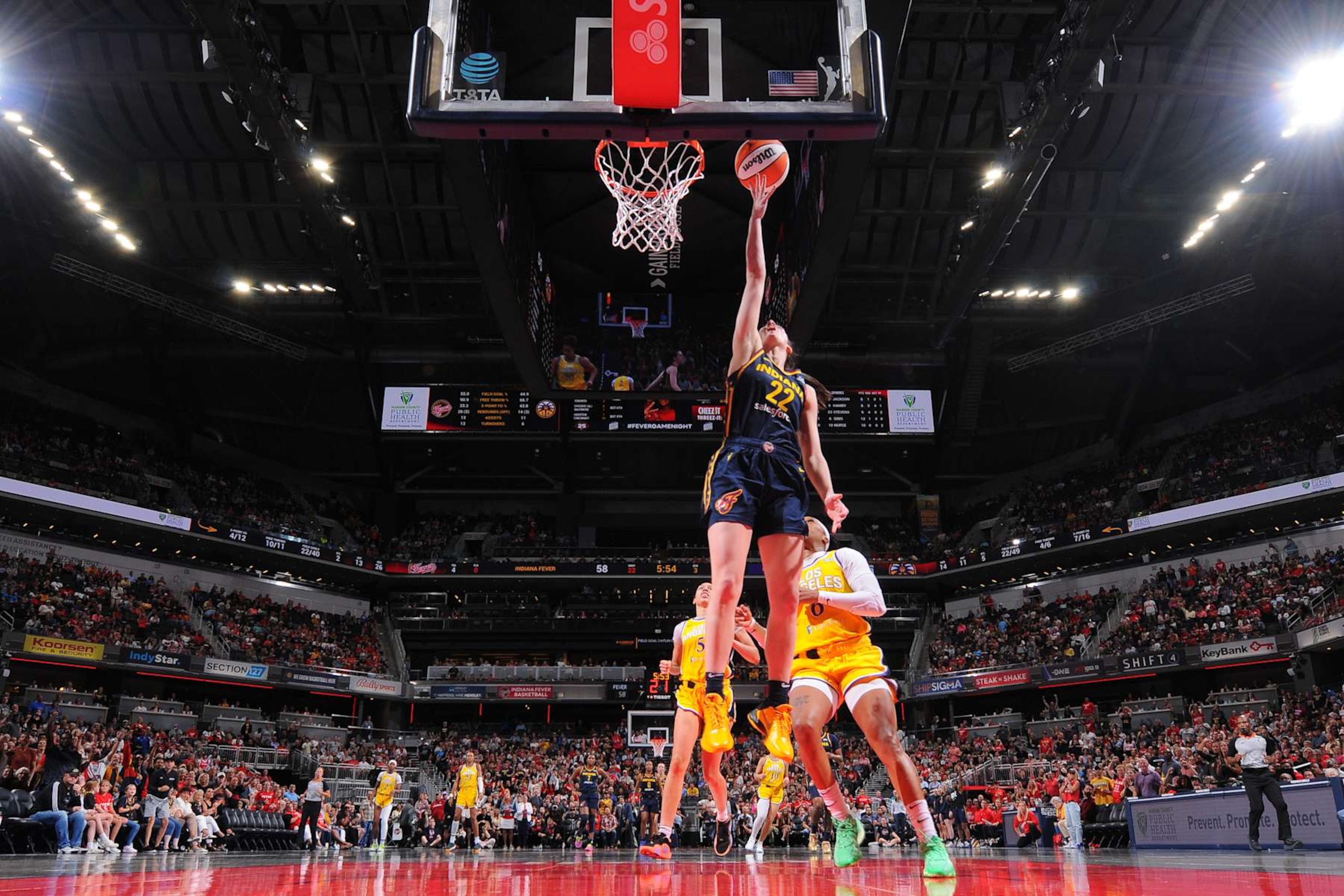 INDIANAPOLIS, IN - SEPTEMBER 4: Caitlin Clark #22 of the Indiana Fever drives to the basket during the game against the Los Angeles Sparks on September 4, 2024 at Gainbridge Fieldhouse in Indianapolis, Indiana. NOTE TO USER: User expressly acknowledges and agrees that, by downloading and or using this Photograph, user is consenting to the terms and conditions of the Getty Images License Agreement. Mandatory Copyright Notice: Copyright 2024 NBAE (Photo by Ron Hoskins/NBAE via Getty Images) INDIANAPOLIS, IN - SEPTEMBER 4: Caitlin Clark #22 of the Indiana Fever drives to the basket during the game against the Los Angeles Sparks on September 4, 2024 at Gainbridge Fieldhouse in Indianapolis, Indiana. NOTE TO USER: User expressly acknowledges and agrees that, by downloading and or using this Photograph, user is consenting to the terms and conditions of the Getty Images License Agreement. Mandatory Copyright Notice: Copyright 2024 NBAE (Photo by Ron Hoskins/NBAE via Getty Images)