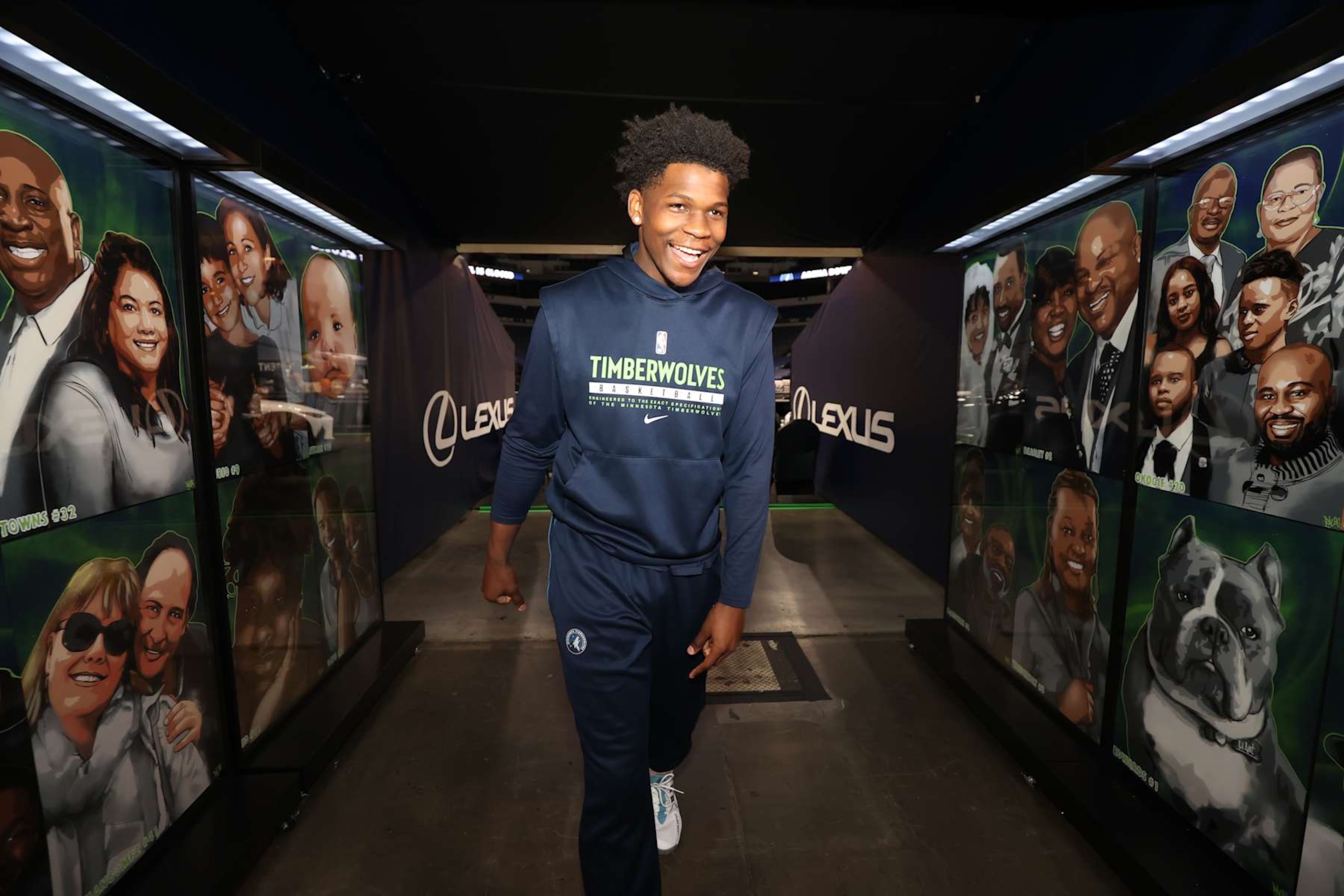 MINNEAPOLIS, MN -  MAY 13: Anthony Edwards #1 of the Minnesota Timberwolves walks through the Raised by Wolves Campaign created by Reggie LeFlore of people who have raised or inspired the players on May 13, 2021 at Target Center in Minneapolis, Minnesota. NOTE TO USER: User expressly acknowledges and agrees that, by downloading and or using this Photograph, user is consenting to the terms and conditions of the Getty Images License Agreement. Mandatory Copyright Notice: Copyright 2021 NBAE (Photo by David Sherman/NBAE via Getty Images)