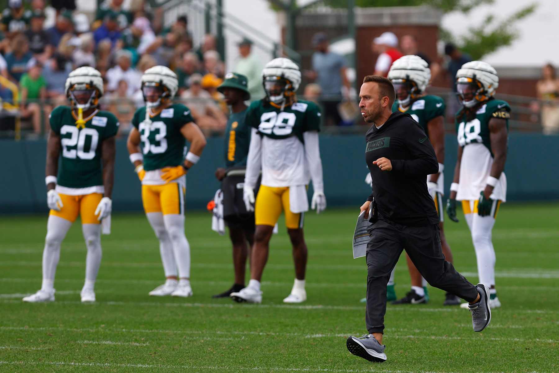 ASHWAUBENON, WI - AUGUST 01: Green Bay Packers defensive coordinator Jeff Hafley runs downfield during Green Bay Packers Training Camp on August 1, 2024, at Ray Nitschke Field in Ashwaubenon, WI. (Photo by Larry Radloff/Icon Sportswire via Getty Images)
