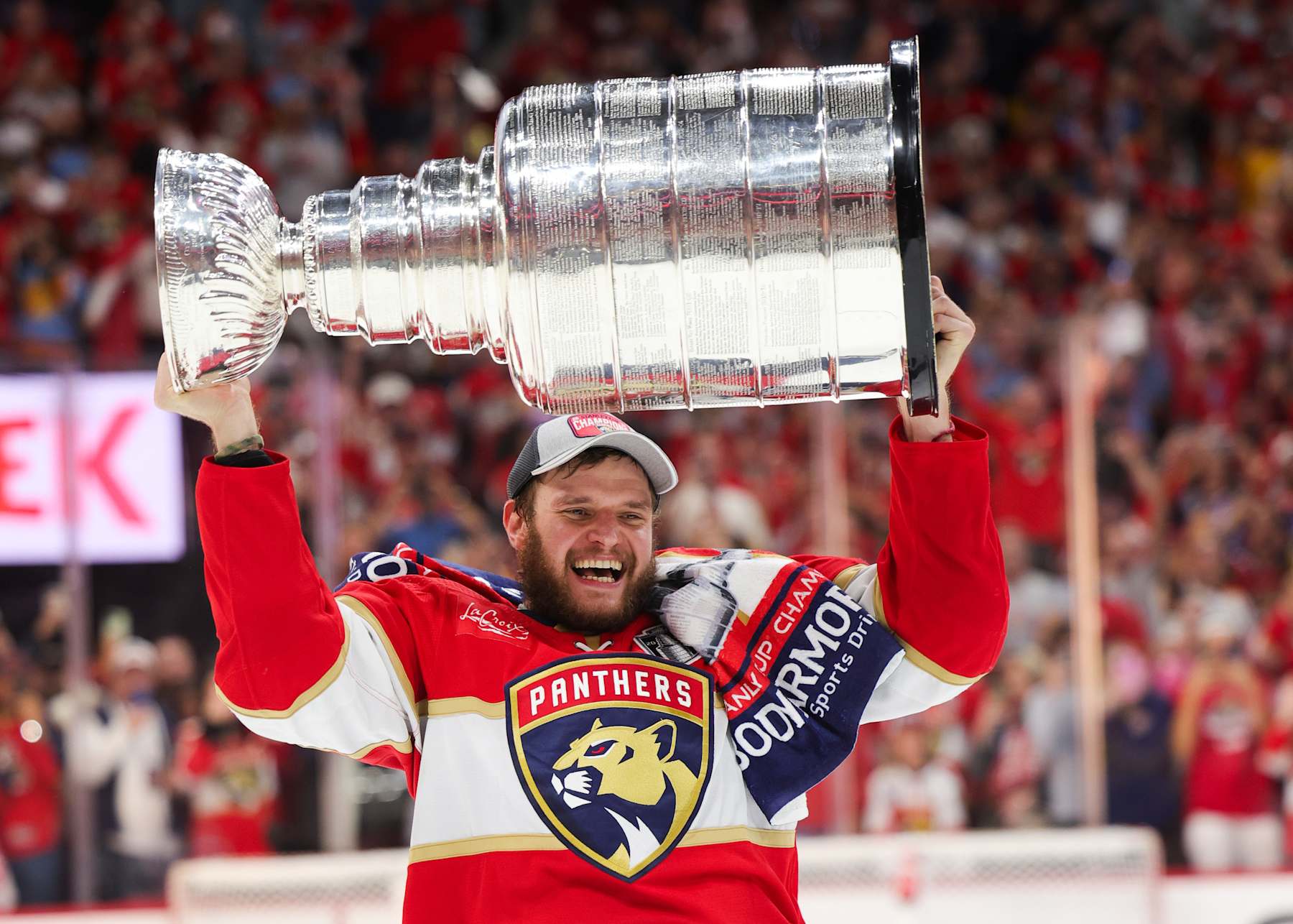 SUNRISE, FLORIDA - JUNE 24: Aleksander Barkov #16 of the Florida Panthers lifts the Stanley Cup after Florida's 2-1 victory against the Edmonton Oilers in Game Seven of the 2024 Stanley Cup Final at Amerant Bank Arena on June 24, 2024 in Sunrise, Florida. (Photo by Carmen Mandato/Getty Images)