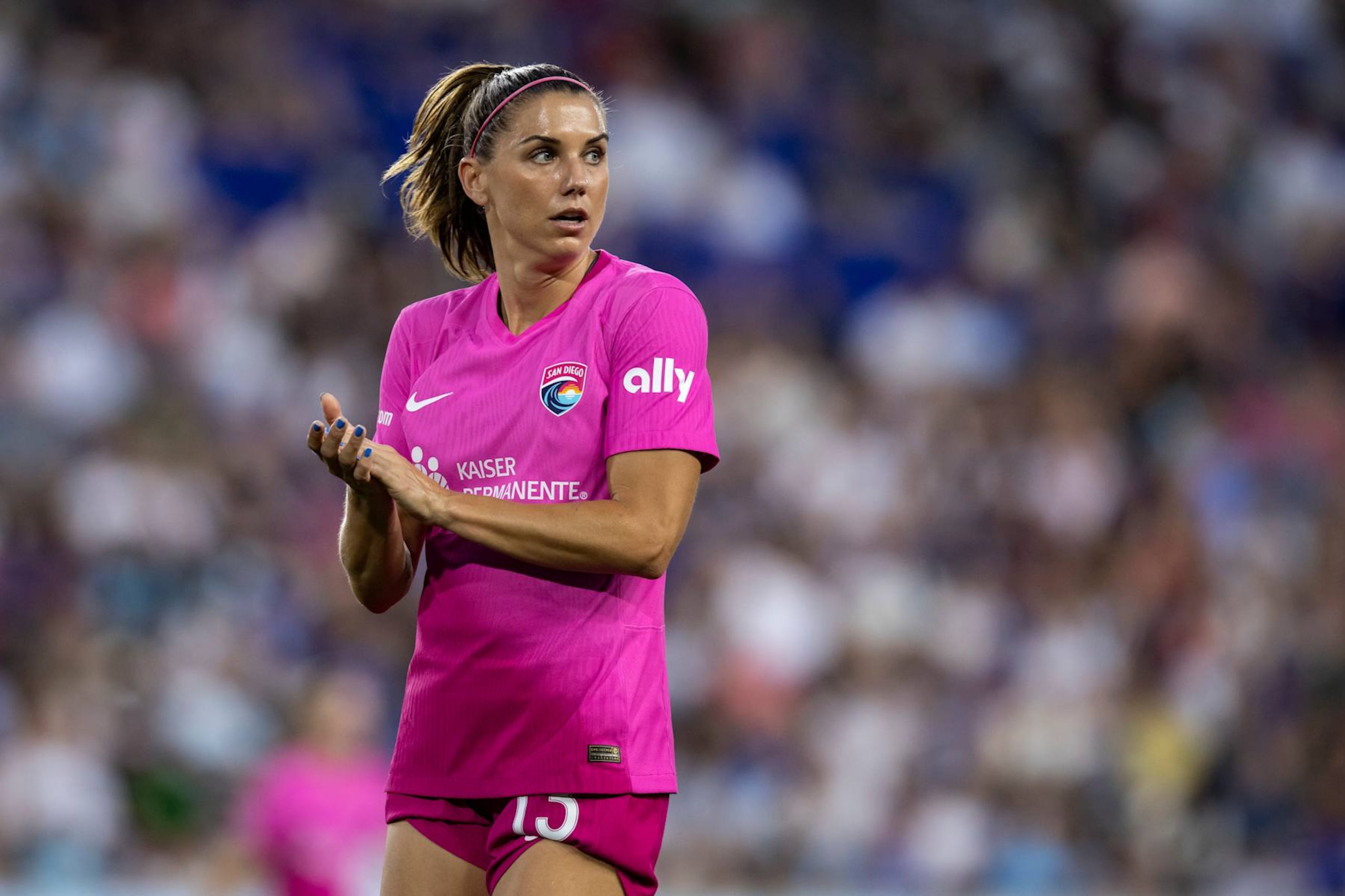 HARRISON, NEW JERSEY - JUNE 19: Alex Morgan #13 of San Diego Wave FC claps for teammate effort in the second half of the National Women's Soccer League match against the NJ/NY Gotham FC at Red Bull Arena on June 19, 2024 in Harrison, New Jersey. (Photo by Ira L. Black - Corbis/Getty Images)