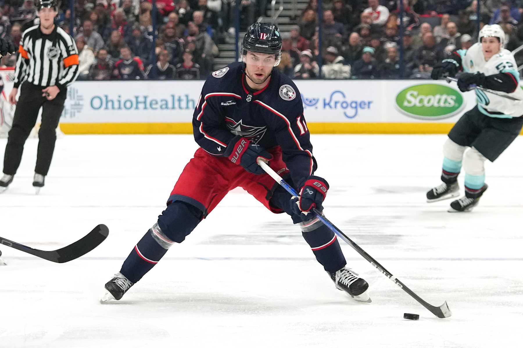 COLUMBUS, OHIO - JANUARY 13: Adam Fantilli #11 of the Columbus Blue Jackets skates with the puck during the second period against the Seattle Kraken at Nationwide Arena on January 13, 2024 in Columbus, Ohio. (Photo by Jason Mowry/Getty Images)