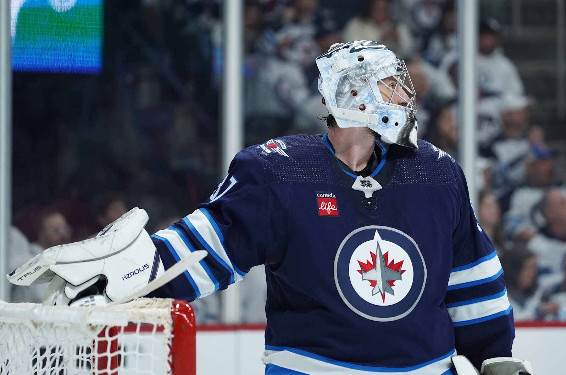 WINNIPEG, CANADA - APRIL 30: Connor Hellebuyck #37 of the Winnipeg Jets during game against the Colorado Avalanche in Game Five of the First Round of the 2024 Stanley Cup Playoffs at Canada Life Centre on April 30, 2024, in Winnipeg, Canada. (Photo by David Lipnowski/Getty Images)