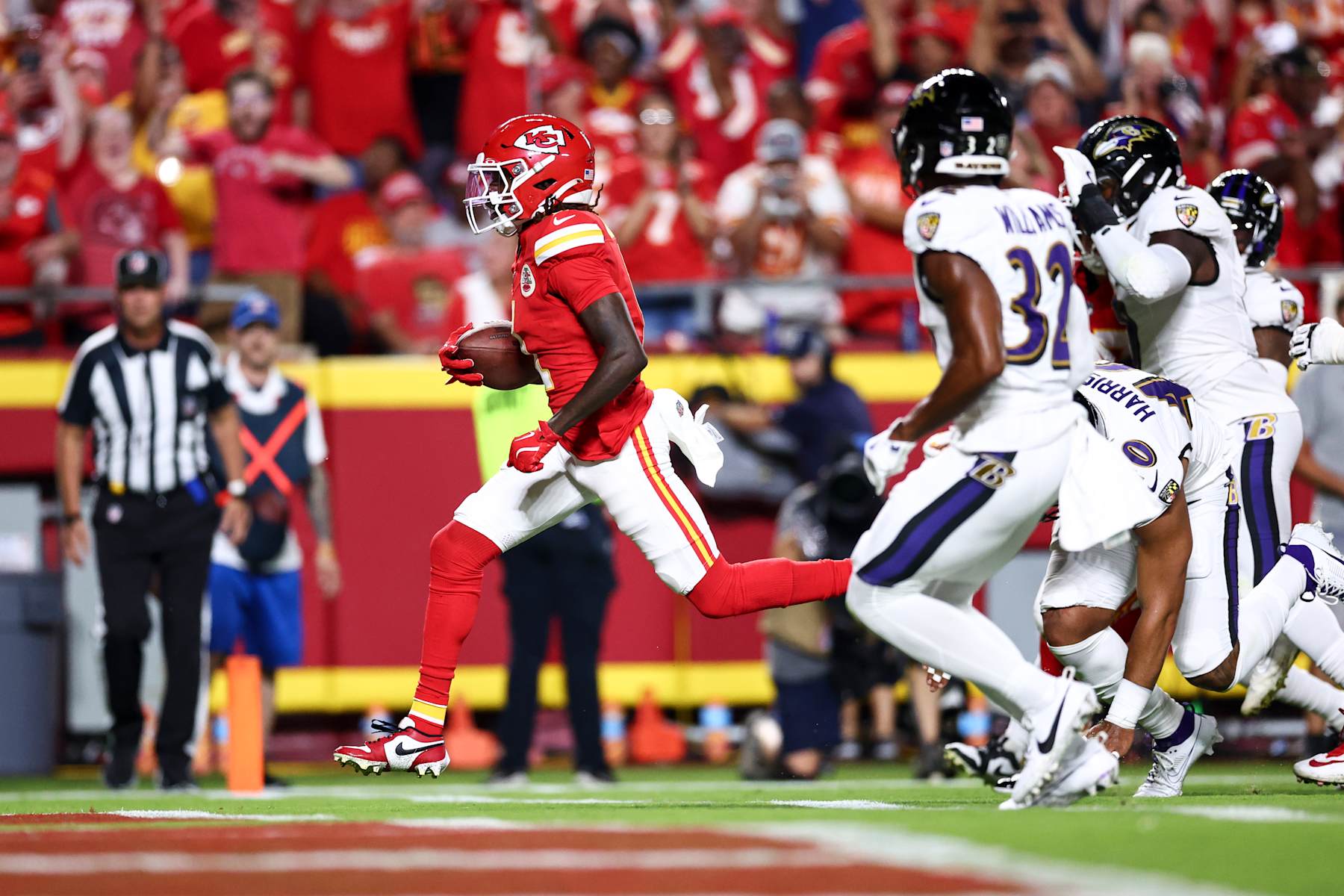 KANSAS CITY, MO - SEPTEMBER 05: Xavier Worthy #1 of the Kansas City Chiefs scores a touchdown during the first quarter of an NFL football game against the Baltimore Ravens at GEHA Field at Arrowhead Stadium on September 5, 2024 in Kansas City, MO. (Photo by Kevin Sabitus/Getty Images)
