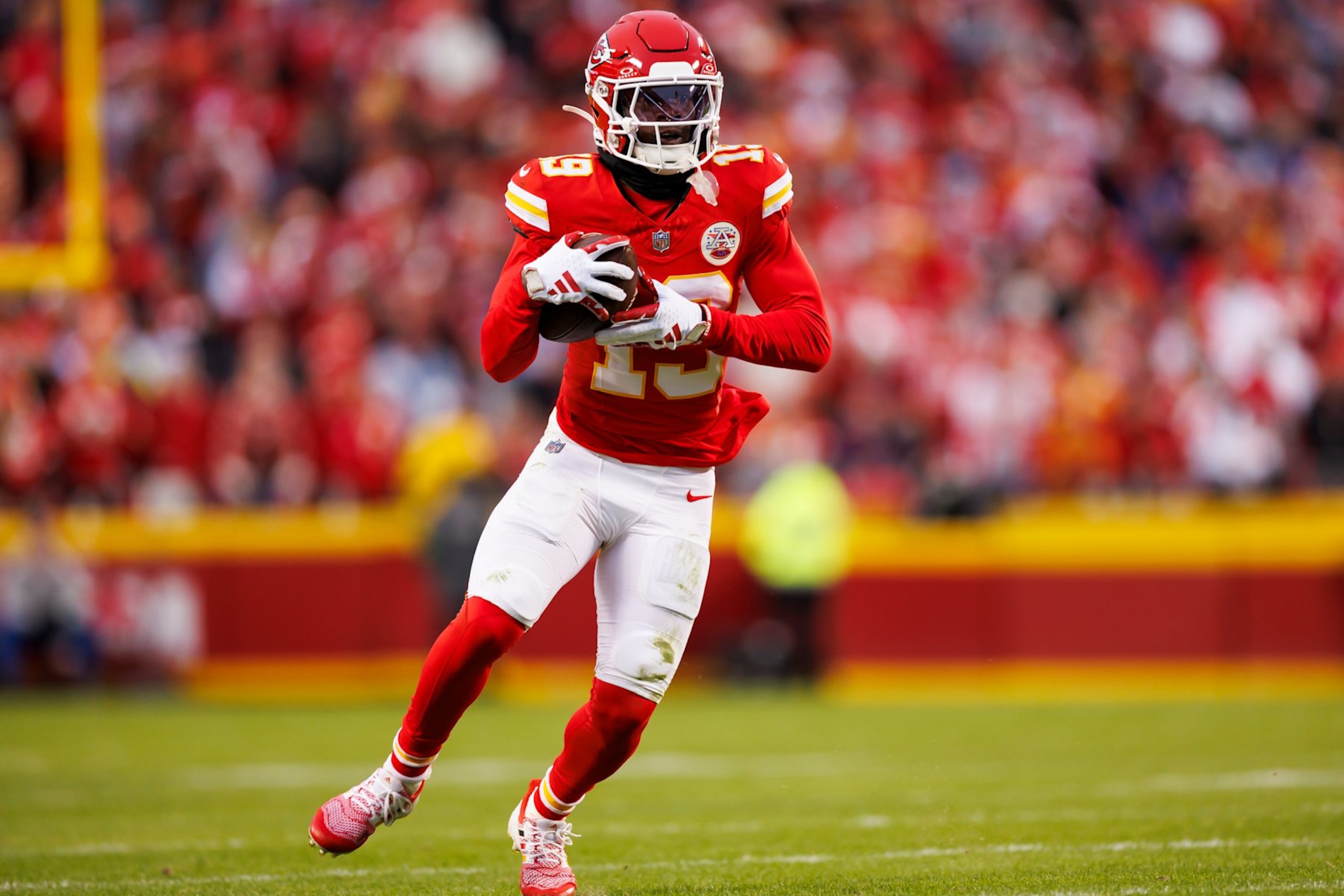 KANSAS CITY, MISSOURI - DECEMBER 10: Kadarius Toney #19 of the Kansas City Chiefs runs the ball after a catch during an NFL football game against the Buffalo Bills at GEHA Field at Arrowhead Stadium on December 10, 2023 in Kansas City, Missouri. (Photo by Ryan Kang/Getty Images)
