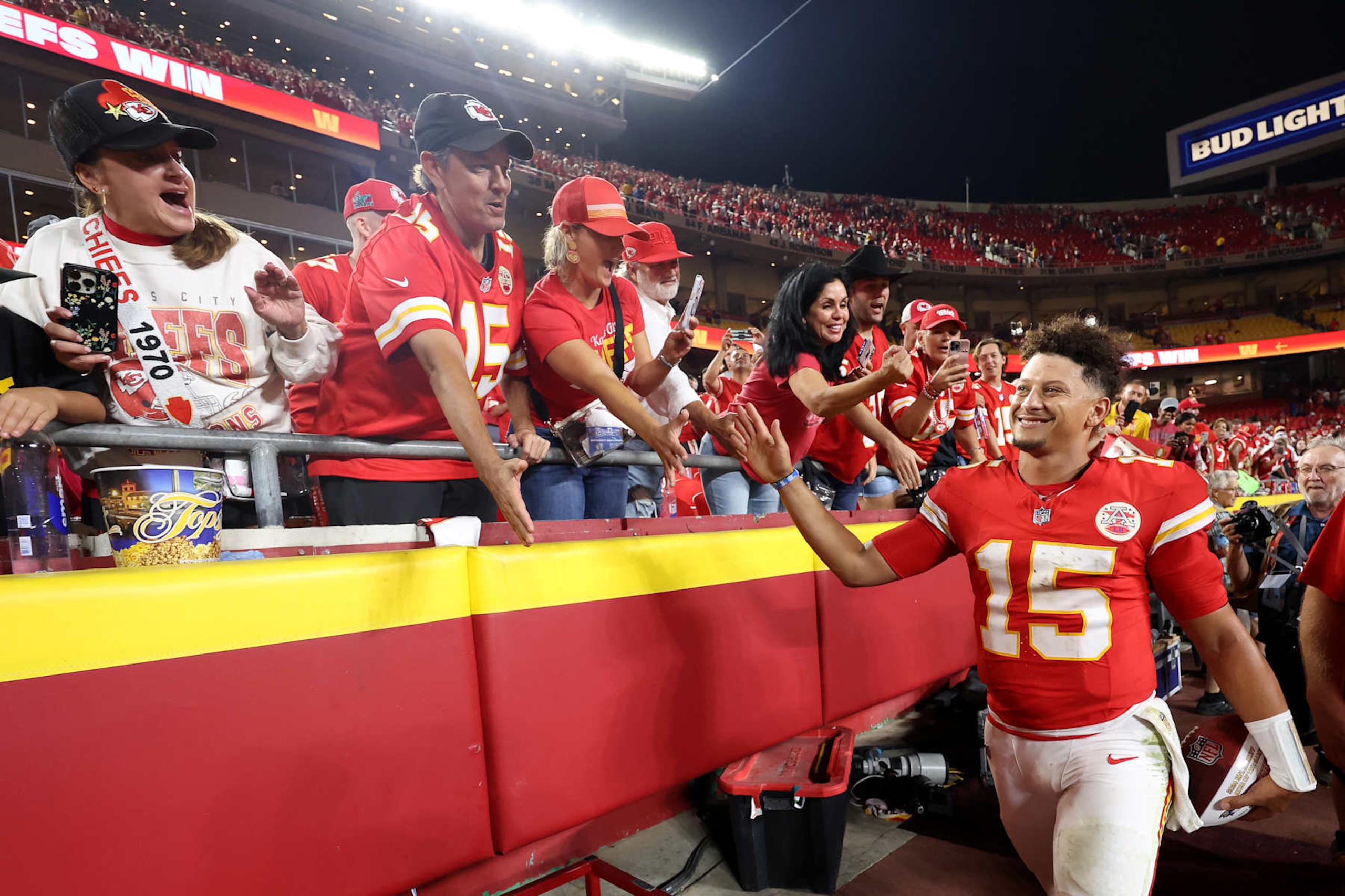KANSAS CITY, MISSOURI - SEPTEMBER 05: Quarterback Patrick Mahomes #15 of the Kansas City Chiefs celebrates with fans after their 27-20 win over the Baltimore Ravens at GEHA Field at Arrowhead Stadium on September 05, 2024 in Kansas City, Missouri. (Photo by Christian Petersen/Getty Images)