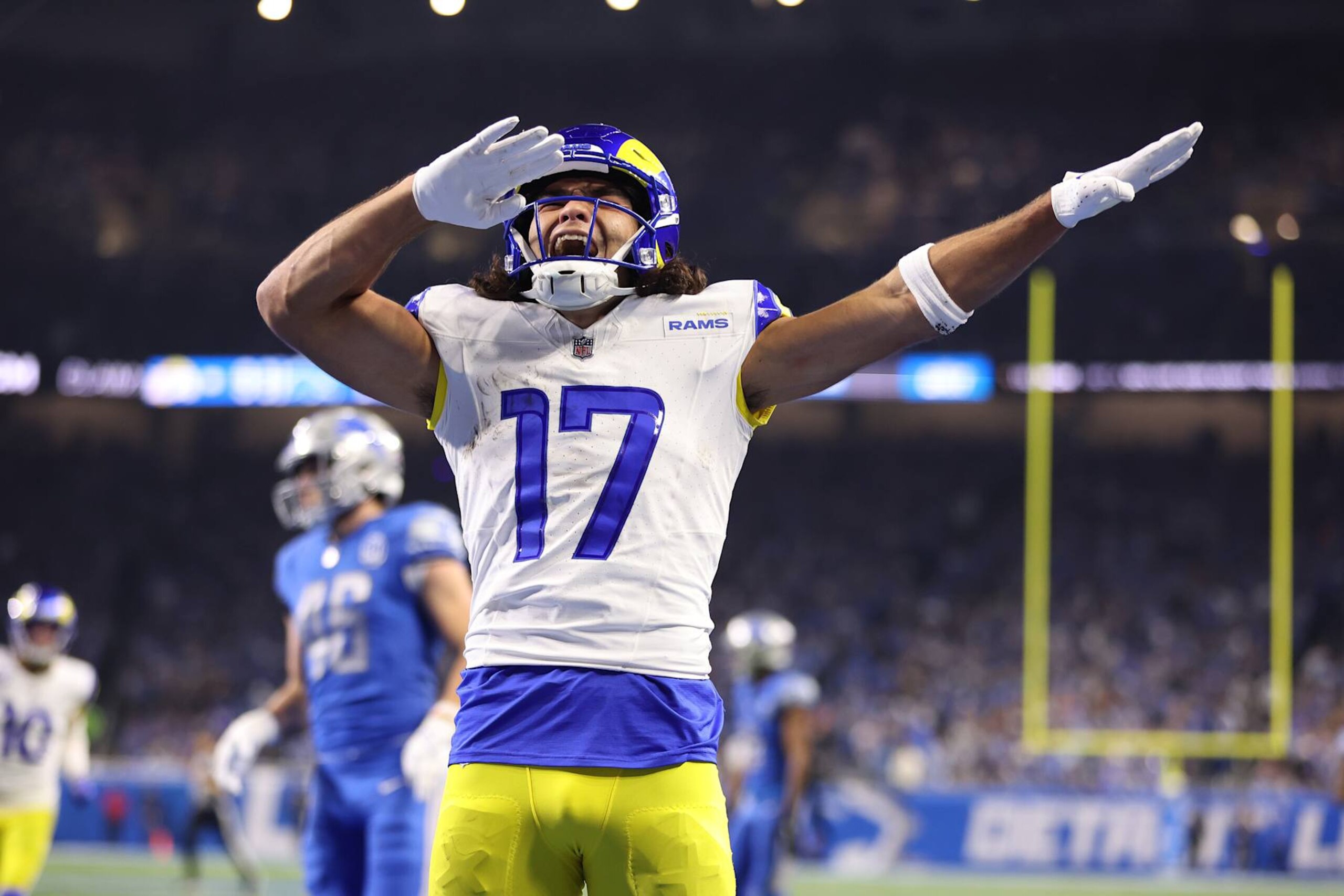 DETROIT, MICHIGAN - JANUARY 14: Puka Nacua #17 of the Los Angeles Rams reacts to a touchdown while playing the Detroit Lions during a NFC Wild Card Playoff game at Ford Field on January 14, 2024 in Detroit, Michigan. (Photo by Gregory Shamus/Getty Images)