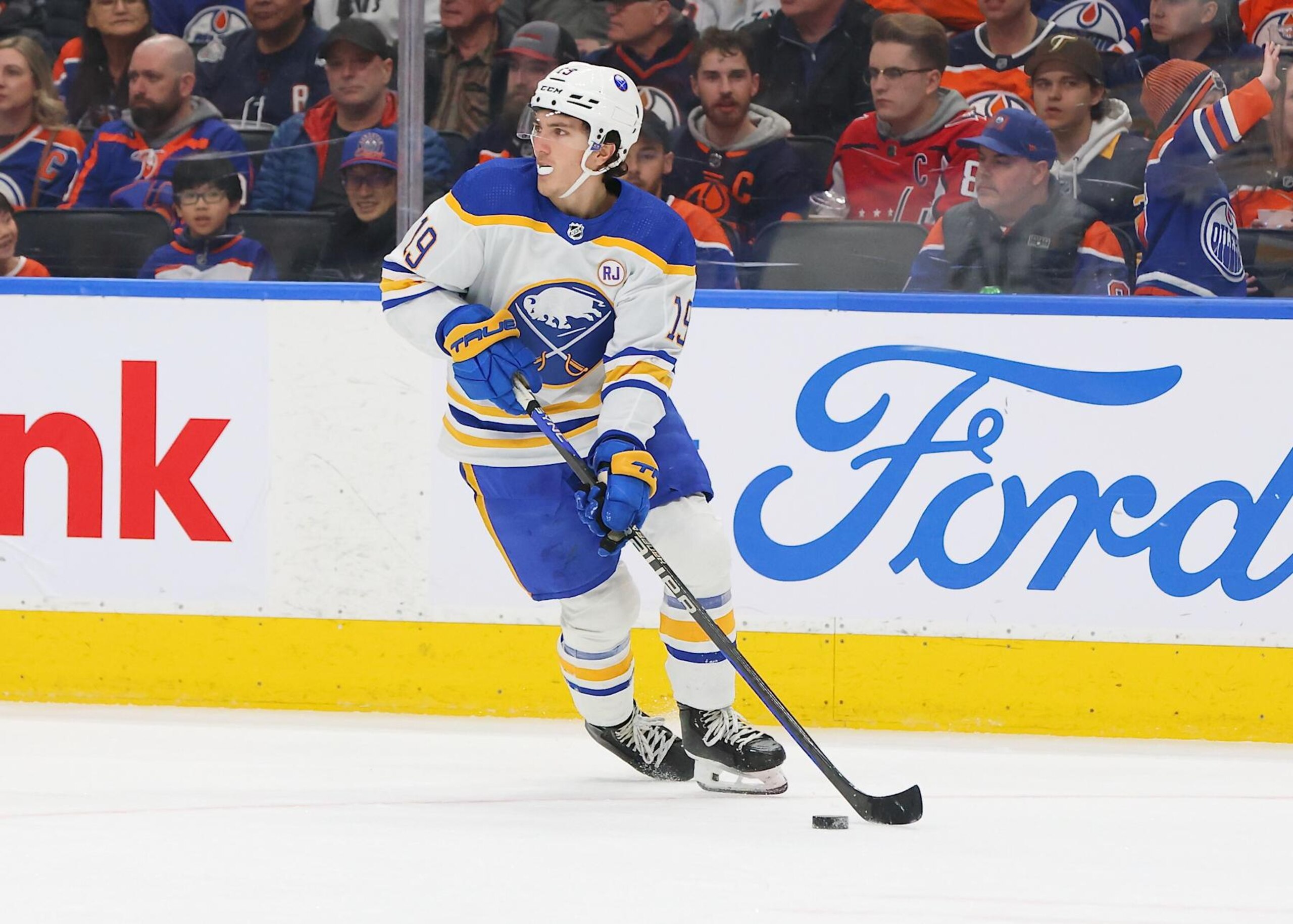 EDMONTON, CANADA - MARCH 21: Peyton Krebs #19 of the Buffalo Sabres skates with the puck in the second period against the Edmonton Oilers on March 21, 2024 at Rogers Place in Edmonton, Alberta, Canada. (Photo by Lawrence Scott/Getty Images) EDMONTON, CANADA - MARCH 21: Peyton Krebs #19 of the Buffalo Sabres skates with the puck in the second period against the Edmonton Oilers on March 21, 2024 at Rogers Place in Edmonton, Alberta, Canada. (Photo by Lawrence Scott/Getty Images)