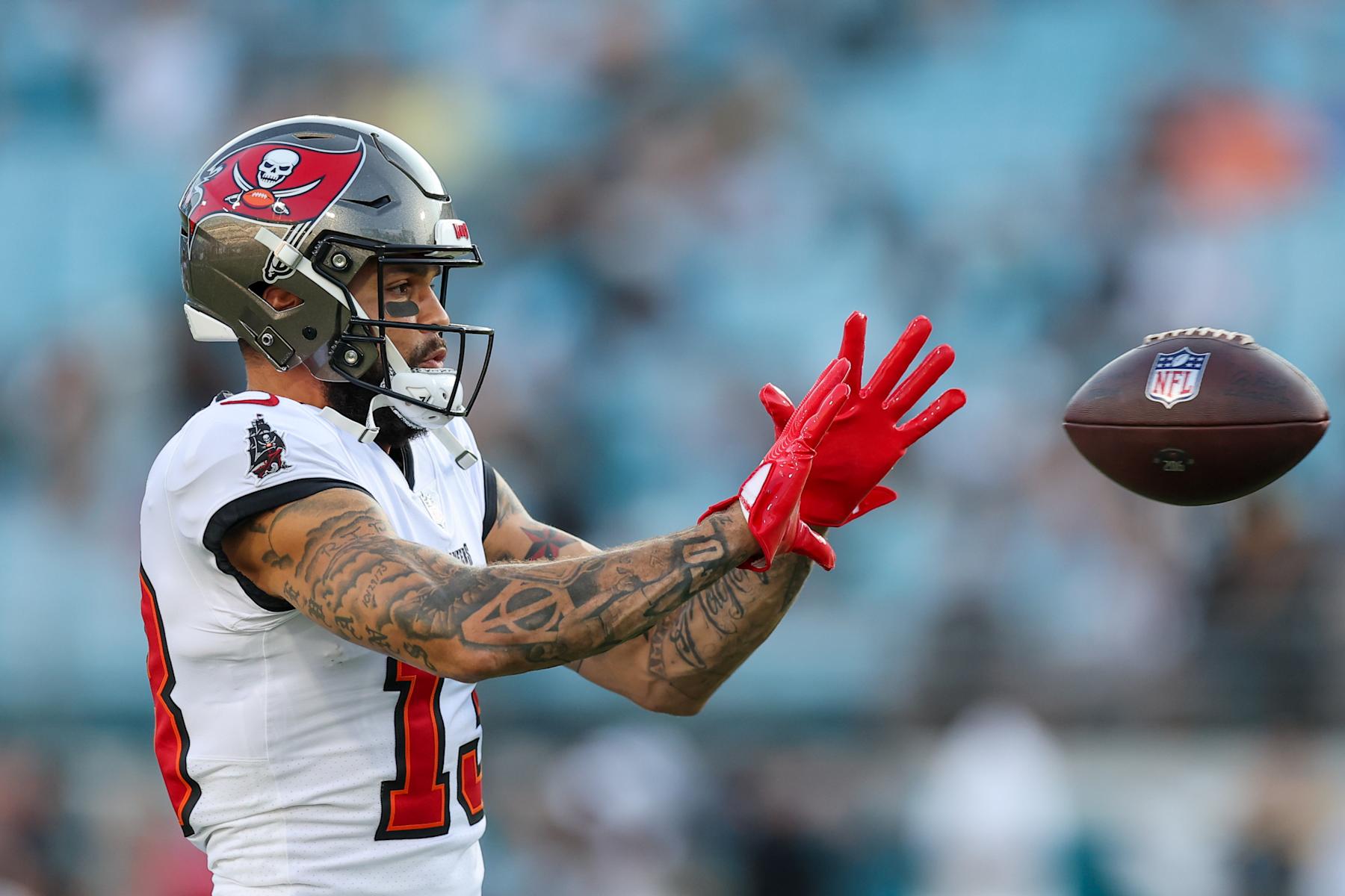 JACKSONVILLE, FLORIDA - AUGUST 17: Mike Evans #13 of the Tampa Bay Buccaneers warms up prior to the preseason game against the Jacksonville Jaguars at EverBank Field on August 17, 2024 in Jacksonville, Florida. (Photo by Mike Carlson/Getty Images)