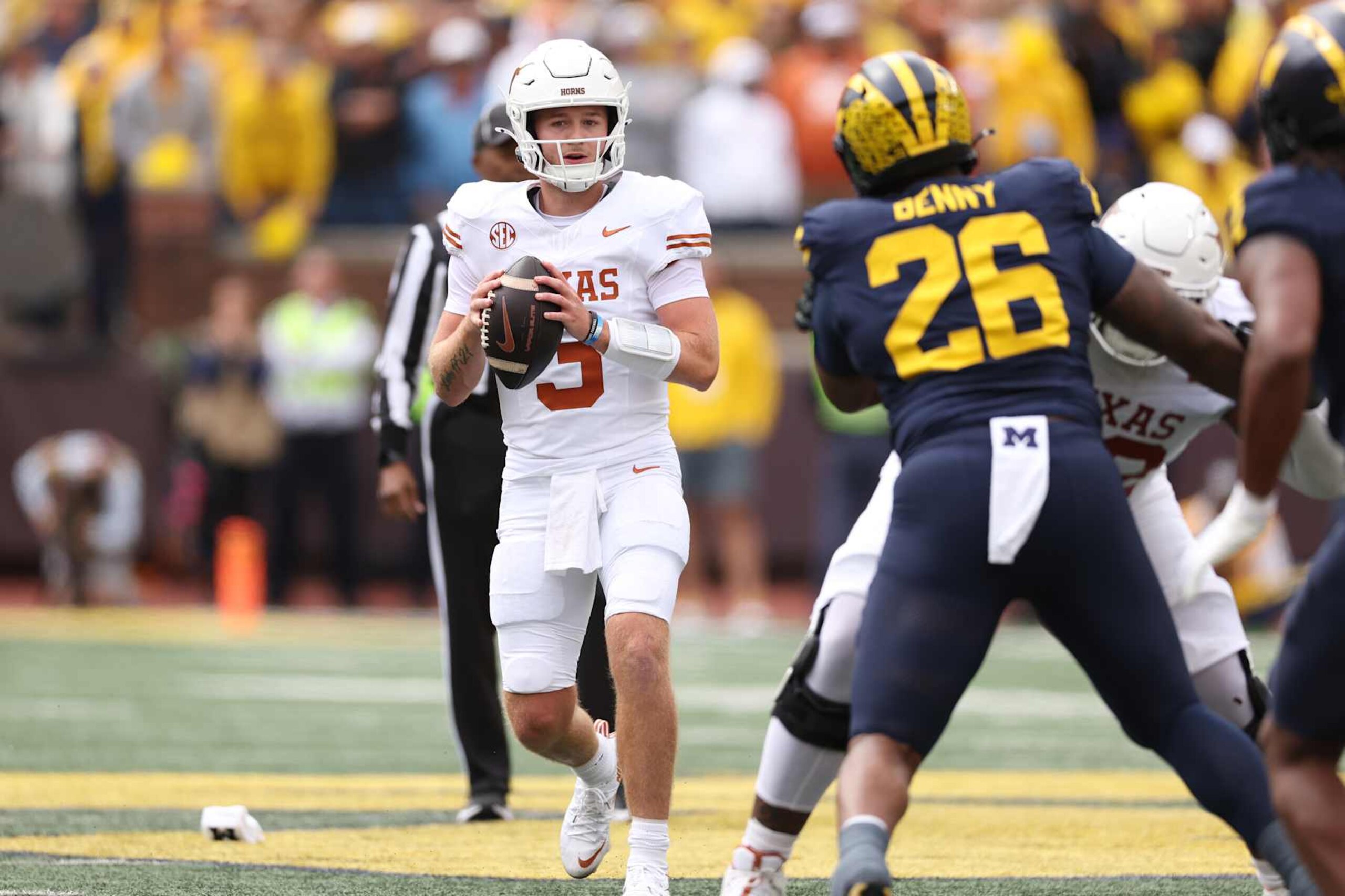 ANN ARBOR, MICHIGAN - SEPTEMBER 07: Quinn Ewers #3 of the Texas Longhorns looks to pass during the first quarter against the Michigan Wolverines at Michigan Stadium on September 07, 2024 in Ann Arbor, Michigan. (Photo by Gregory Shamus/Getty Images) ANN ARBOR, MICHIGAN - SEPTEMBER 07: Quinn Ewers #3 of the Texas Longhorns looks to pass during the first quarter against the Michigan Wolverines at Michigan Stadium on September 07, 2024 in Ann Arbor, Michigan. (Photo by Gregory Shamus/Getty Images)