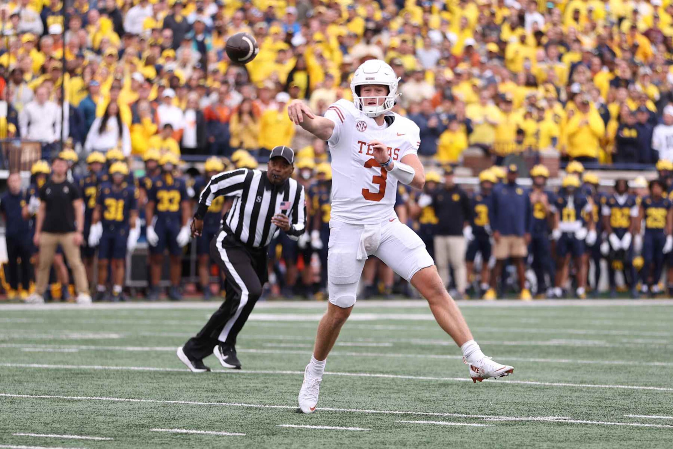 ANN ARBOR, MICHIGAN - SEPTEMBER 07: Quinn Ewers #3 of the Texas Longhorns throws a touchdown pass during the second quarter against the Michigan Wolverines at Michigan Stadium on September 07, 2024 in Ann Arbor, Michigan. (Photo by Gregory Shamus/Getty Images) ANN ARBOR, MICHIGAN - SEPTEMBER 07: Quinn Ewers #3 of the Texas Longhorns throws a touchdown pass during the second quarter against the Michigan Wolverines at Michigan Stadium on September 07, 2024 in Ann Arbor, Michigan. (Photo by Gregory Shamus/Getty Images)
