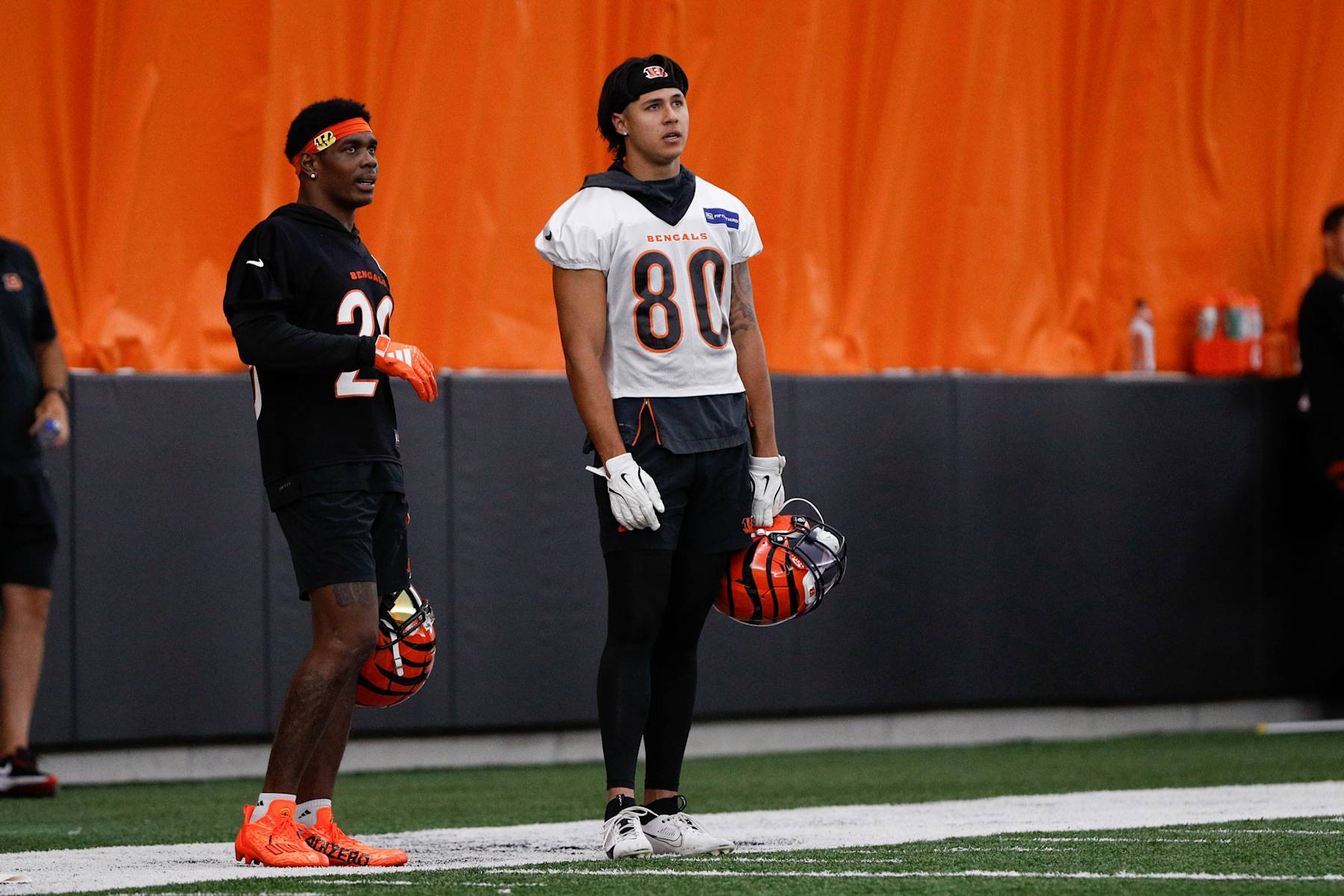 CINCINNATI, OH - JUNE 13: Cincinnati Bengals cornerback Cam Taylor-Britt (29) stands with wide receiver Andrei Iosivas (80) during the Cincinnati Bengals minicamp at the IEL Indoor Facility on June 13, 2024 in Cincinnati, Ohio. (Photo by Ian Johnson/Icon Sportswire via Getty Images)