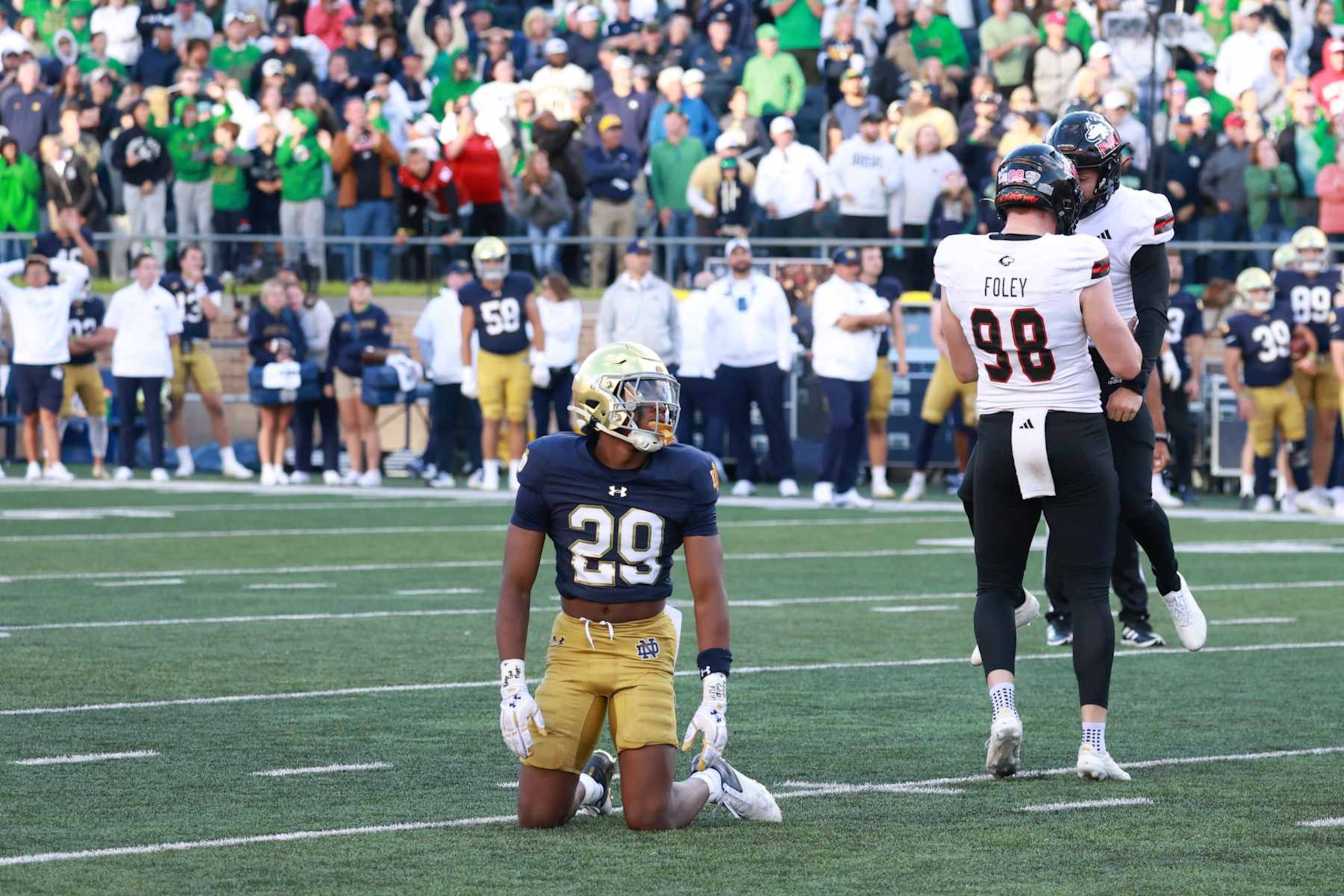 SOUTH BEND, IN - SEPTEMBER 07: Northern Illinois Huskies kicker Kanon Woodill (92) is congratulated by holder Tom Foley (98) after making the winning field goal against the Notre Dame Fighting Irish on September 7, 2024, at Notre Dame Stadium in South Bend, Indiana. (Photo by Brian Spurlock/Icon Sportswire via Getty Images)