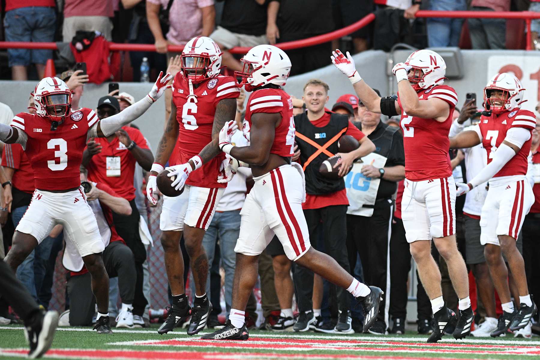LINCOLN, NEBRASKA - SEPTEMBER 07: Tommi Hill #6 of the Nebraska Cornhuskers celebrates a touchdown after an interception against the Colorado Buffaloes during the first quarter at Memorial Stadium on September 7, 2024 in Lincoln, Nebraska. (Photo by Steven Branscombe/Getty Images)