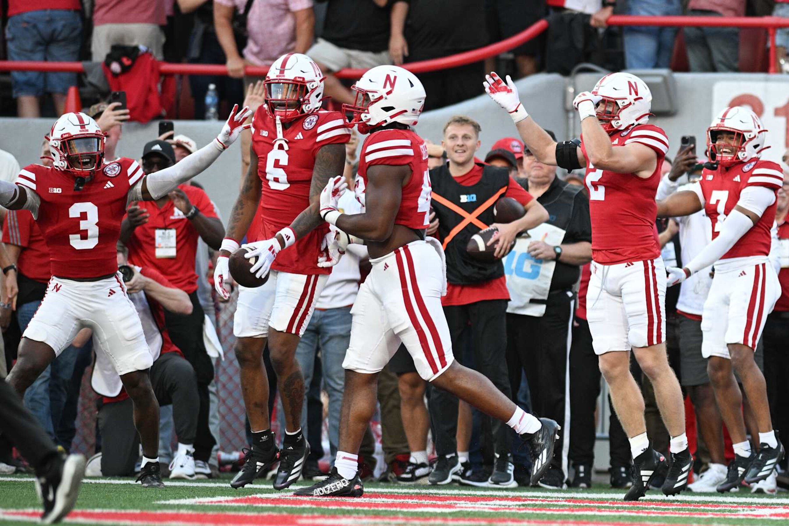 LINCOLN, NEBRASKA - SEPTEMBER 07: Tommi Hill #6 of the Nebraska Cornhuskers celebrates a touchdown after an interception against the Colorado Buffaloes during the first quarter at Memorial Stadium on September 7, 2024 in Lincoln, Nebraska. (Photo by Steven Branscombe/Getty Images)