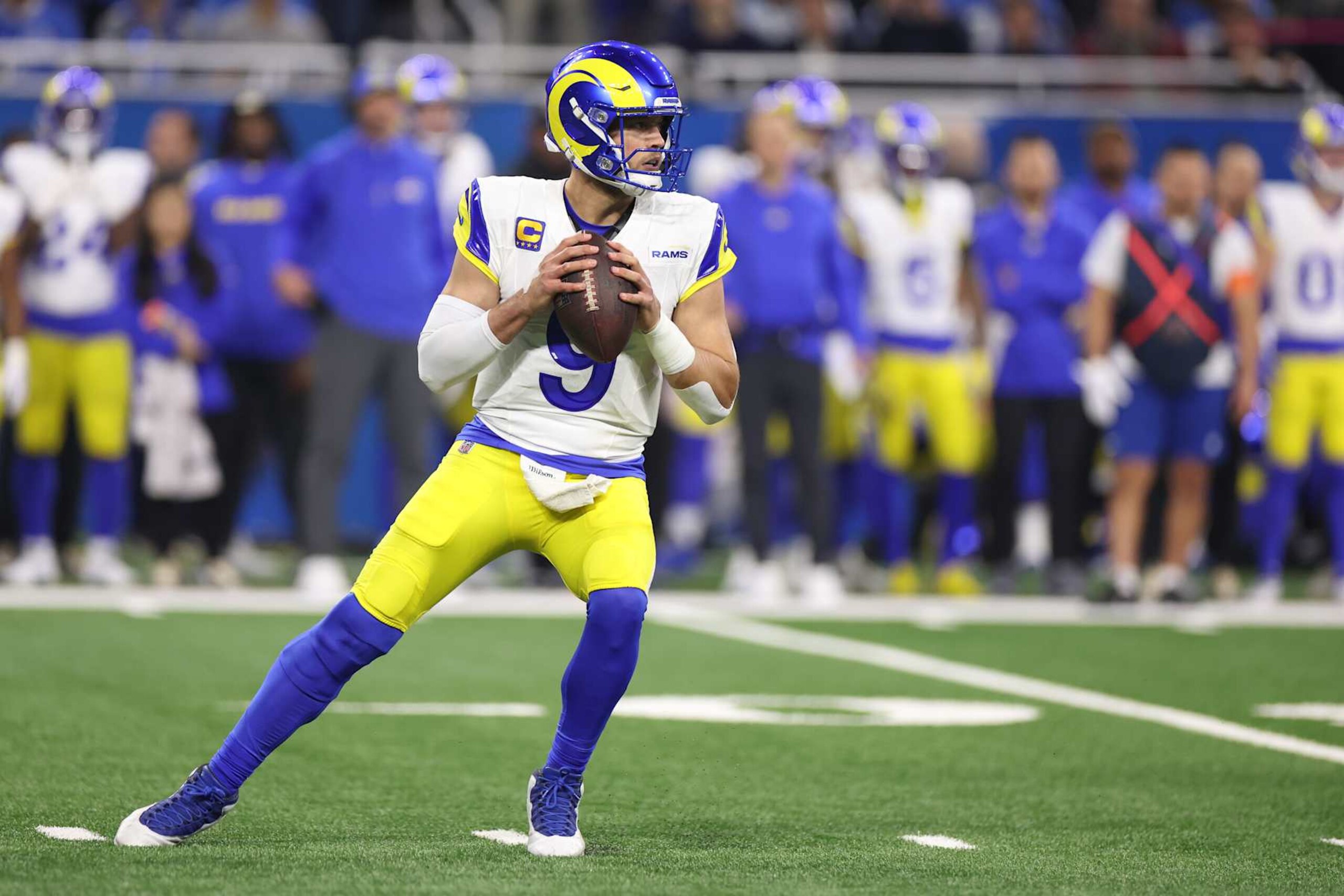 DETROIT, MICHIGAN - JANUARY 14: Matthew Stafford #9 of the Los Angeles Rams plays against Detroit Lions during a NFC Wild Card Playoff game at Ford Field on January 14, 2024 in Detroit, Michigan. (Photo by Gregory Shamus/Getty Images)