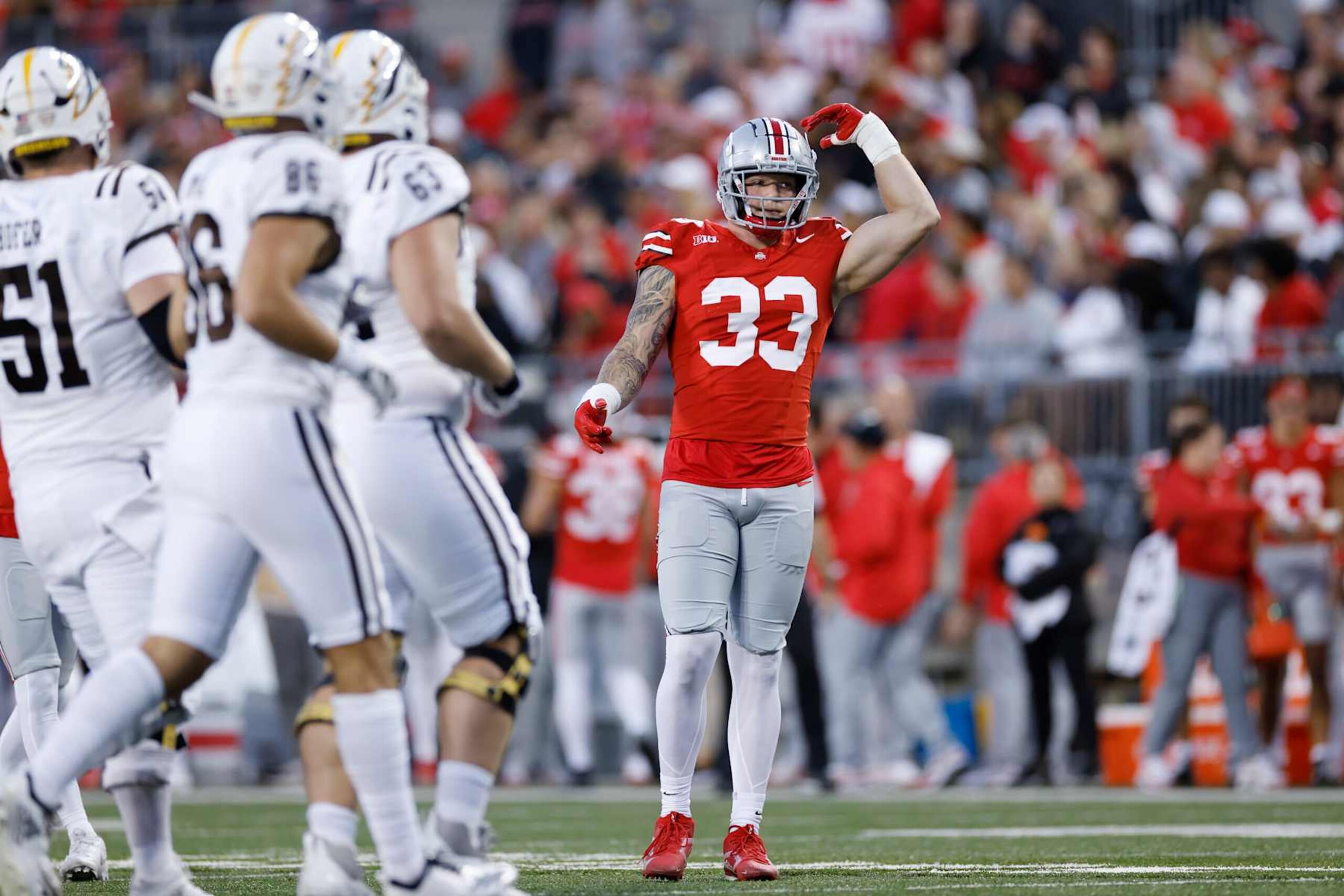 COLUMBUS, OH - SEPTEMBER 07: Ohio State Buckeyes defensive end Jack Sawyer (33) calls for crowd noise before a play during a college football game against the Western Michigan Broncos on September 07, 2024 at Ohio Stadium in Columbus, Ohio. (Photo by Joe Robbins/Icon Sportswire via Getty Images) COLUMBUS, OH - SEPTEMBER 07: Ohio State Buckeyes defensive end Jack Sawyer (33) calls for crowd noise before a play during a college football game against the Western Michigan Broncos on September 07, 2024 at Ohio Stadium in Columbus, Ohio. (Photo by Joe Robbins/Icon Sportswire via Getty Images)