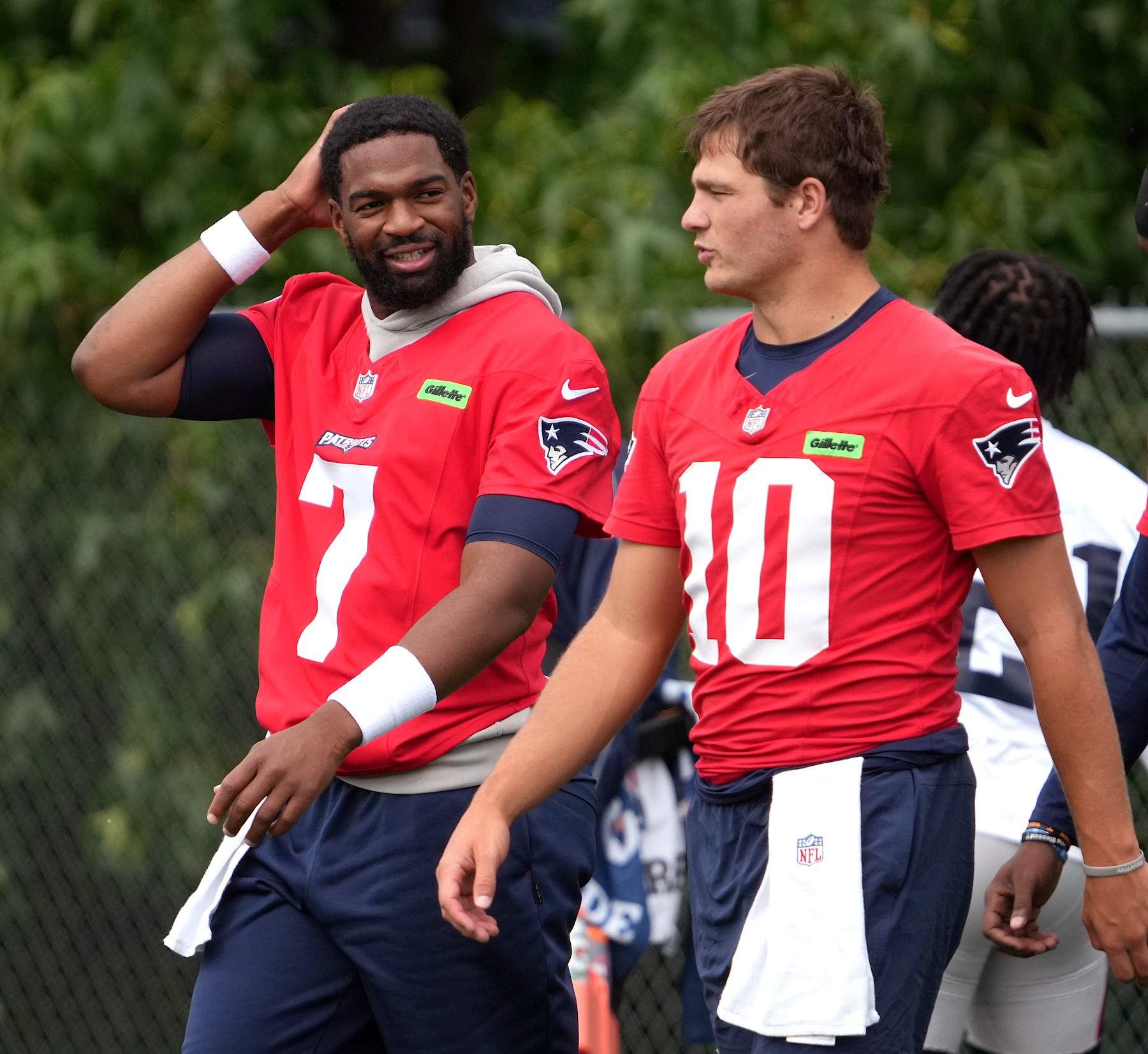 Foxborough, MA - August 29: New England Patriots QBs Jacoby Brissett and Drake Maye. (Photo by Barry Chin/The Boston Globe via Getty Images)