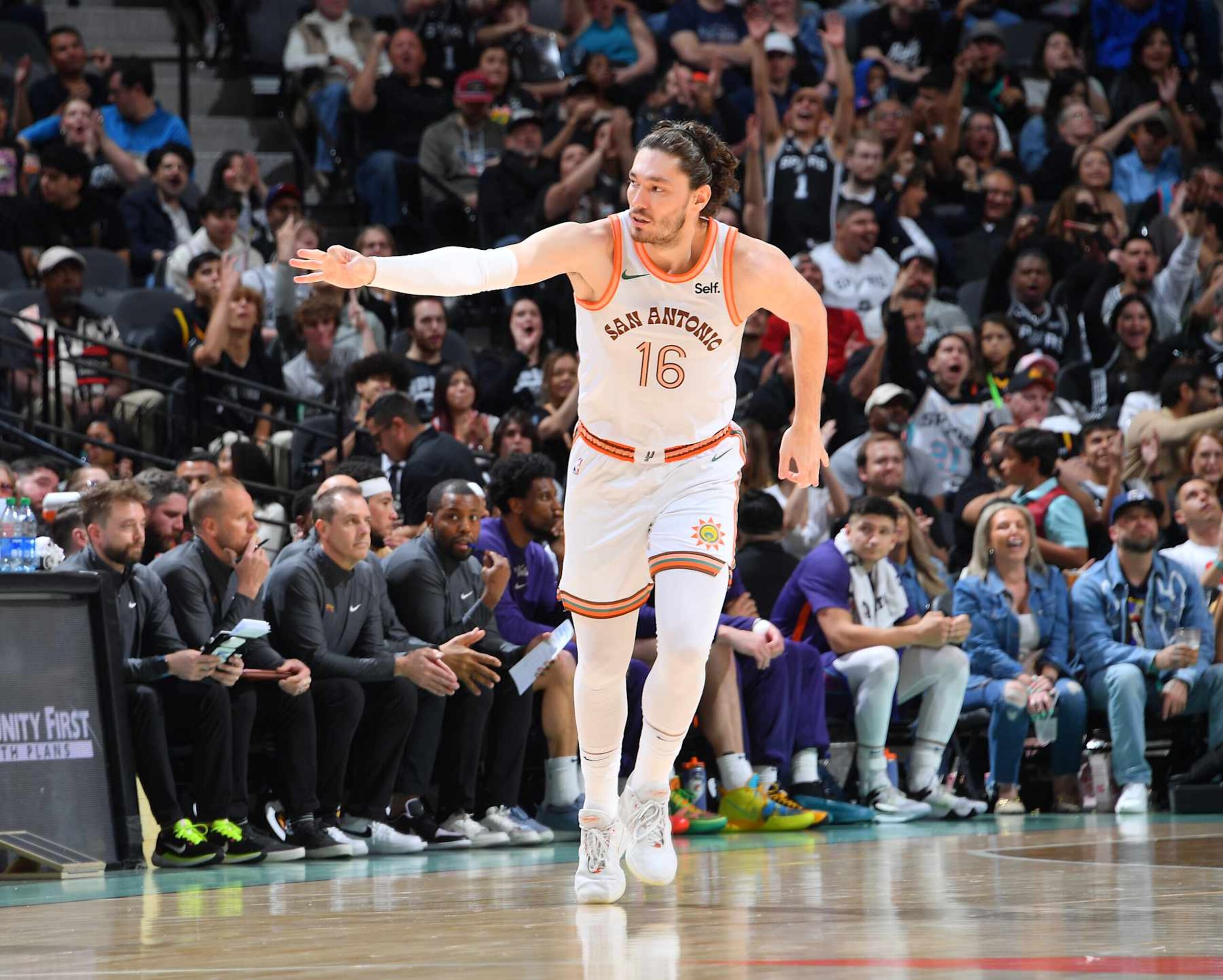 SAN ANTONIO, TX - MARCH 25: Cedi Osman #16 of the San Antonio Spurs celebrates during the game against the Phoenix Suns on March 25, 2024 at the Frost Bank Center in San Antonio, Texas. NOTE TO USER: User expressly acknowledges and agrees that, by downloading and or using this photograph, user is consenting to the terms and conditions of the Getty Images License Agreement. Mandatory Copyright Notice: Copyright 2024 NBAE (Photos by Michael Gonzales/NBAE via Getty Images)