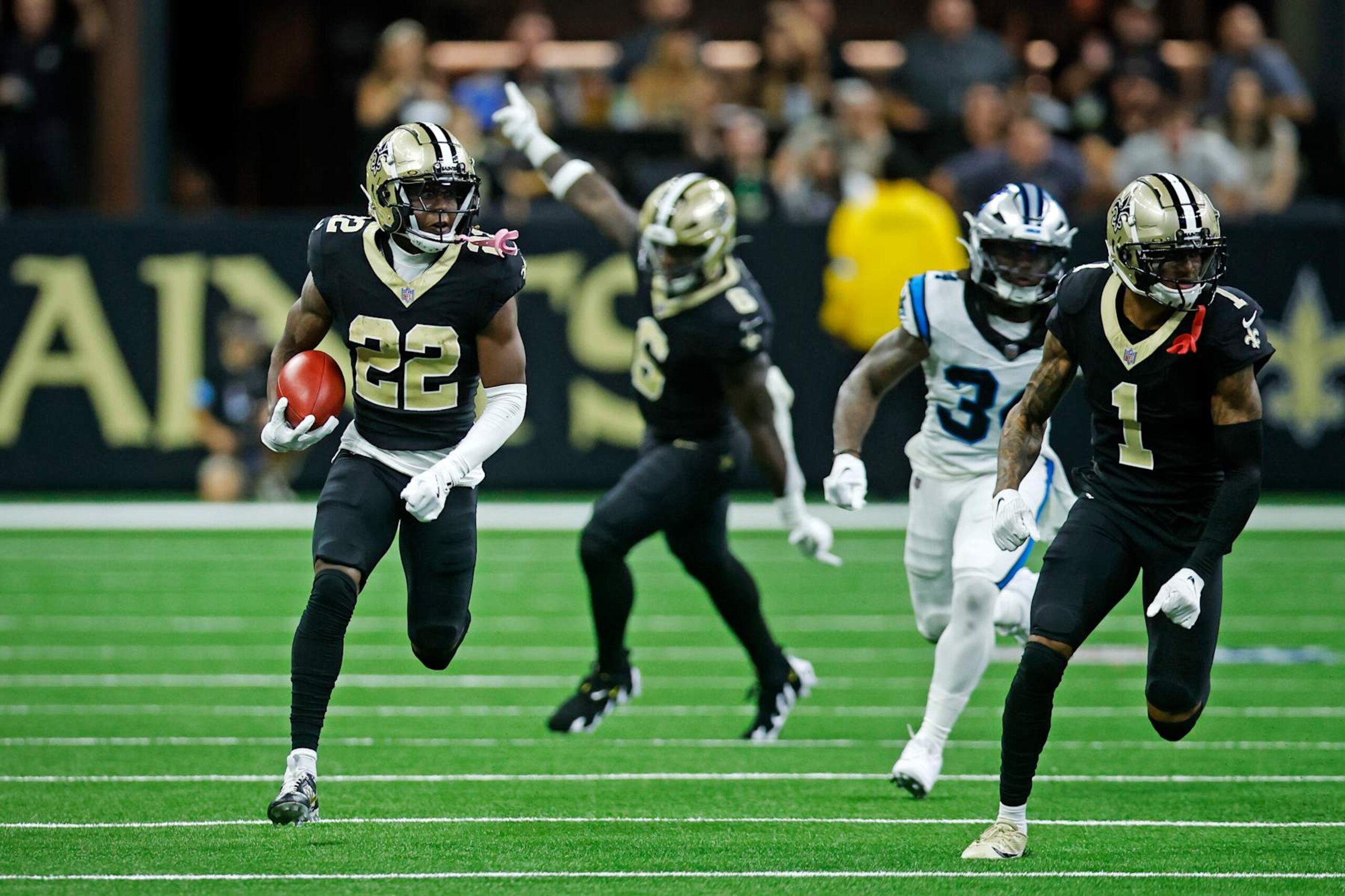 NEW ORLEANS, LOUISIANA - SEPTEMBER 08: Rashid Shaheed #22 of the New Orleans Saints runs the ball during the second quarter against the Carolina Panthers at Caesars Superdome on September 08, 2024 in New Orleans, Louisiana. (Photo by Chris Graythen/Getty Images)
