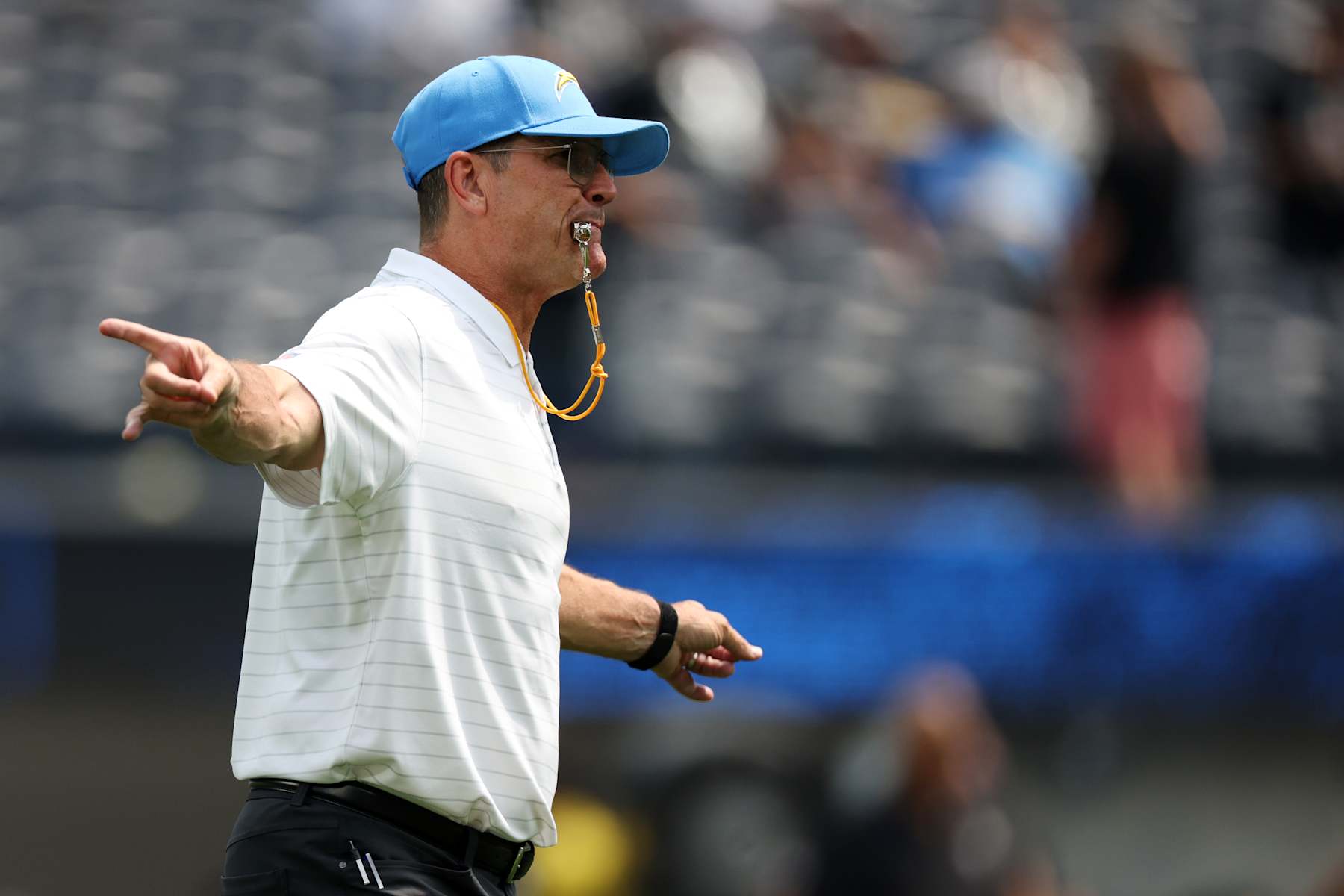 INGLEWOOD, CALIFORNIA - SEPTEMBER 08: Head coach Jim Harbaugh of the Los Angeles Chargers blows his whistle prior to a game against the Las Vegas Raiders at SoFi Stadium on September 08, 2024 in Inglewood, California. (Photo by Harry How/Getty Images)