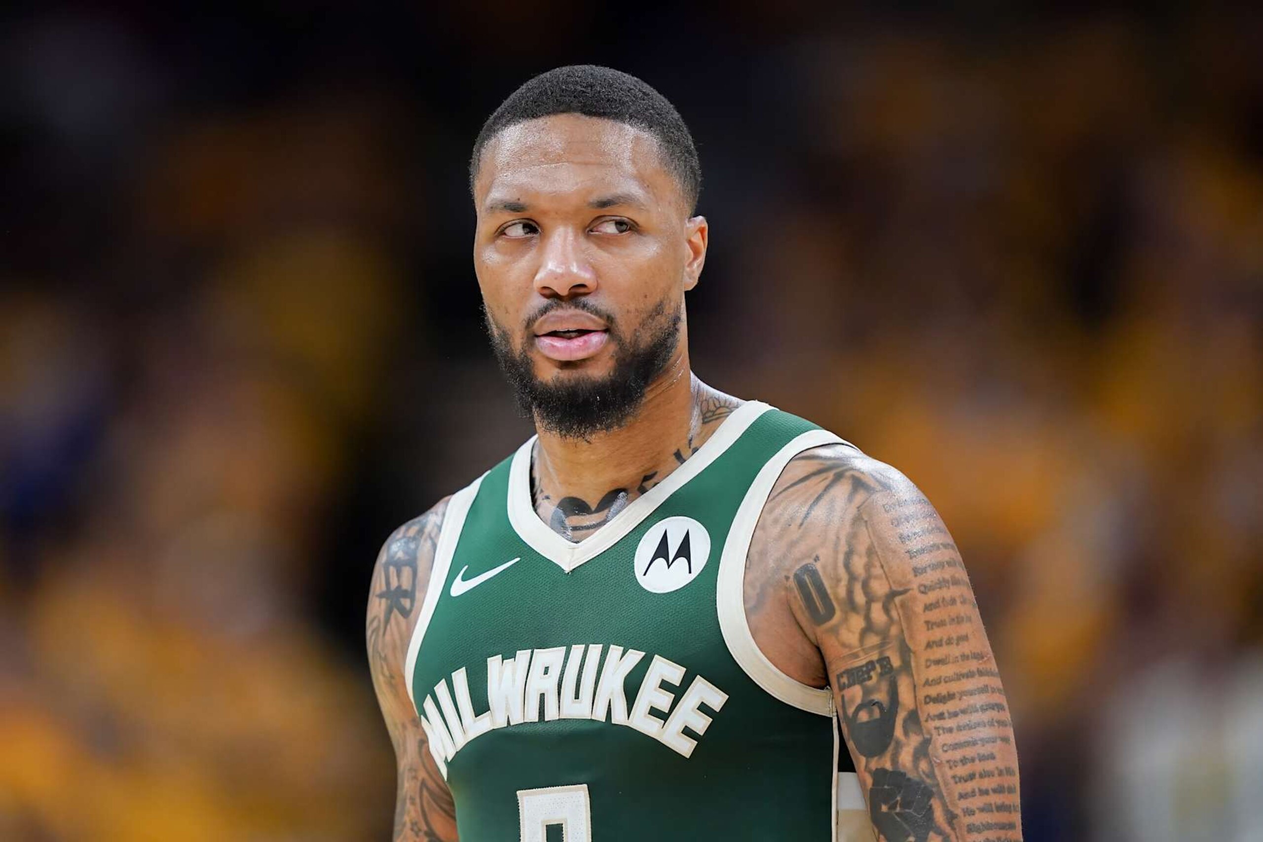 INDIANAPOLIS, INDIANA - APRIL 26: Damian Lillard #0 of the Milwaukee Bucks walks across the court in the fourth quarter during game three of the Eastern Conference First Round Playoffs at Gainbridge Fieldhouse on April 26, 2024 in Indianapolis, Indiana. NOTE TO USER: User expressly acknowledges and agrees that, by downloading and or using this photograph, User is consenting to the terms and conditions of the Getty Images License Agreement. (Photo by Dylan Buell/Getty Images)