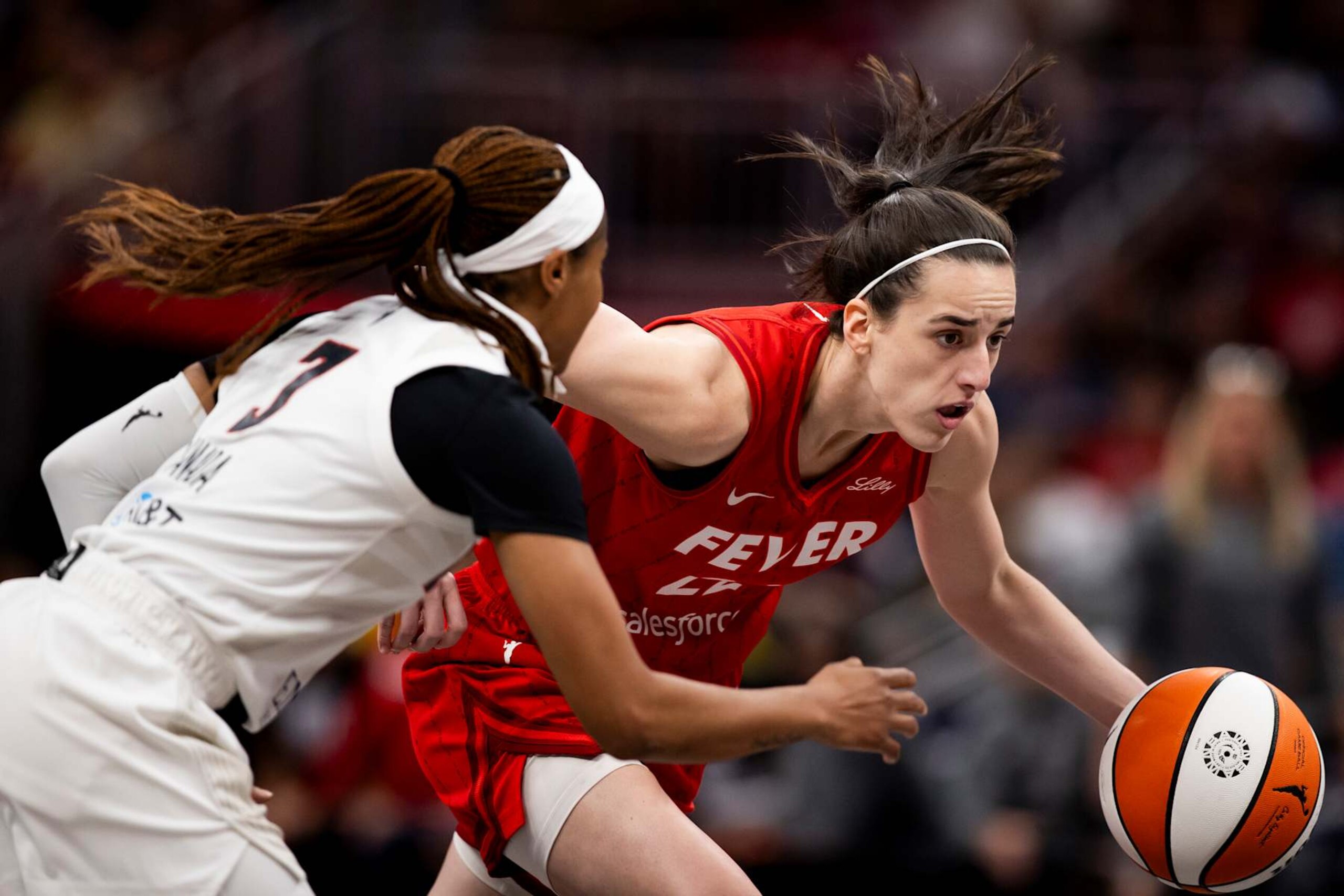 INDIANAPOLIS, INDIANA - SEPTEMBER 8: Caitlin Clark of the Indiana Fever drives against Jordin Canada of the Atlanta dream in the first quarter at Gainbridge Fieldhouse on September 8, 2024 in Indianapolis, Indiana. NOTE TO USER: User expressly acknowledges and agrees that, by downloading and or using this photograph, User is consenting to the terms and conditions of the Getty Images License Agreement. (Photo by Chet White/Getty Images)