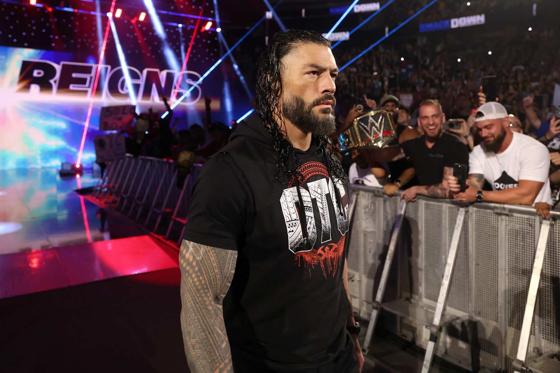 ORLANDO, FLORIDA - AUGUST 16: Roman Reigns makes his entrance during WWE Friday Night SmackDown on Fox at Kia Center on August 16, 2024 in Orlando, Florida.  (Photo by WWE/Getty Images)