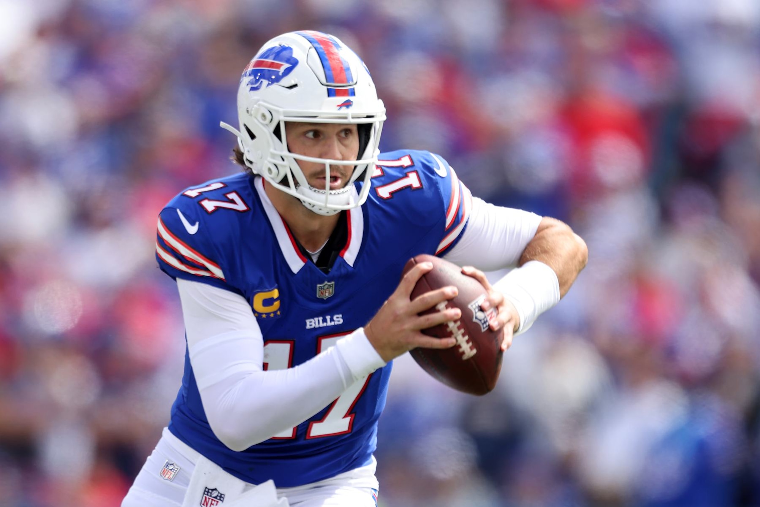 ORCHARD PARK, NEW YORK - SEPTEMBER 08: Josh Allen #17 of the Buffalo Bills scrambles during the second quarter against the Arizona Cardinals at Highmark Stadium on September 08, 2024 in Orchard Park, New York. (Photo by Bryan M. Bennett/Getty Images)
