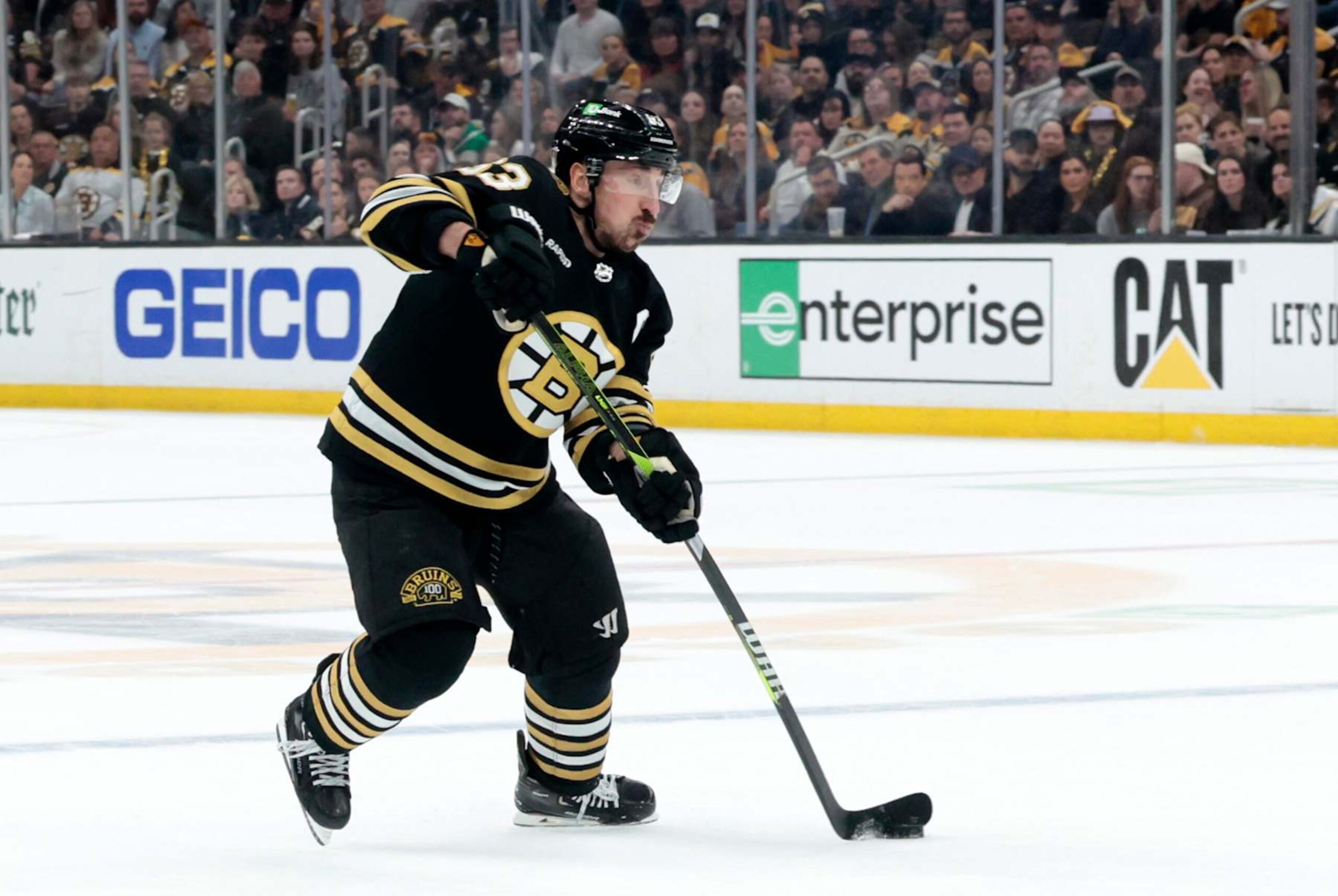 BOSTON, MA - MAY 17: Boston Bruins left wing Brad Marchand (63) takes a shot during Game 6 of the Eastern Conference Second Round playoffs between the Boston Bruins and the Florida Panthers on May 17, 2024, at TD Garden in Boston, Massachusetts.(Photo by Fred Kfoury III/Icon Sportswire via Getty Images) BOSTON, MA - MAY 17: Boston Bruins left wing Brad Marchand (63) takes a shot during Game 6 of the Eastern Conference Second Round playoffs between the Boston Bruins and the Florida Panthers on May 17, 2024, at TD Garden in Boston, Massachusetts.(Photo by Fred Kfoury III/Icon Sportswire via Getty Images)