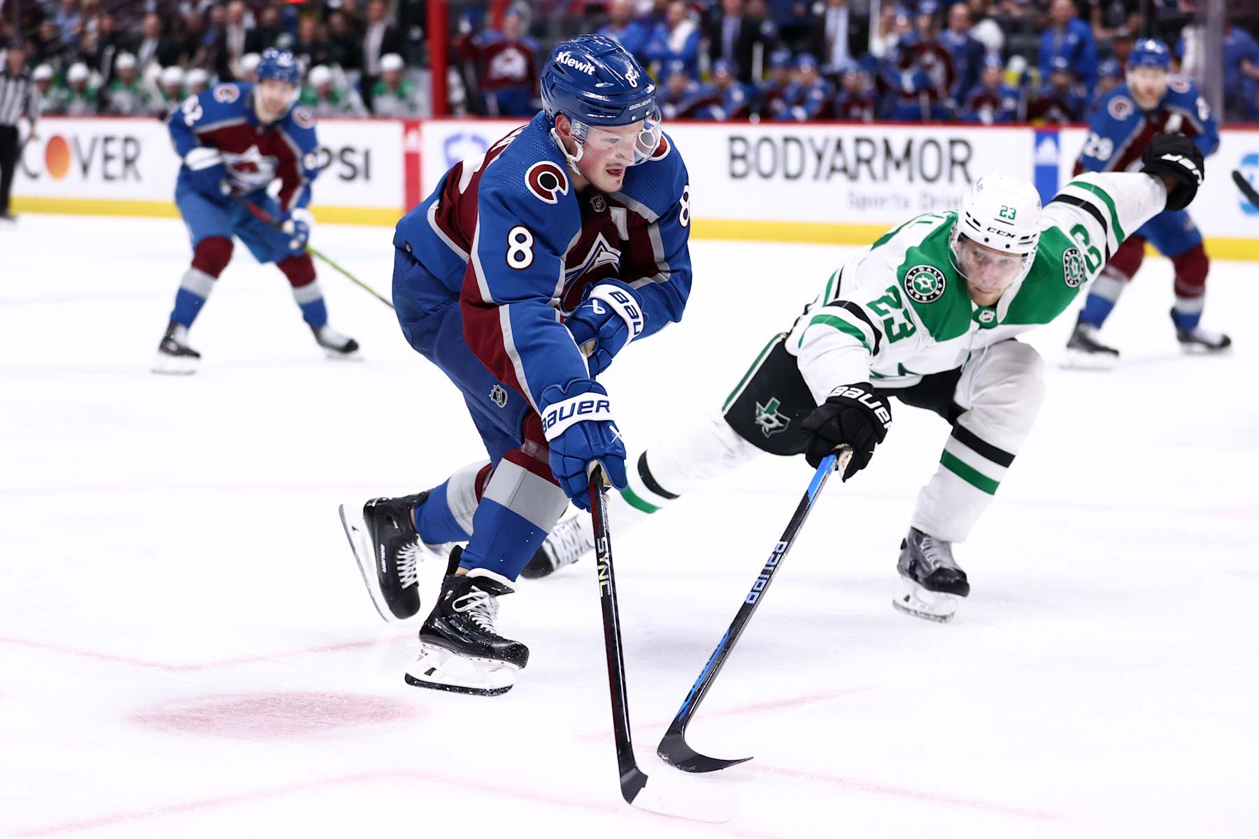 DENVER, COLORADO - MAY 17: Cale Makar #8 of the Colorado Avalanche skates against Esa Lindell #23 of the Dallas Stars during the second period in Game Six of the Second Round of the 2024 Stanley Cup Playoffs at Ball Arena on May 17, 2024 in Denver, Colorado.  (Photo by Tyler Schank/Clarkson Creative/Getty Images)
