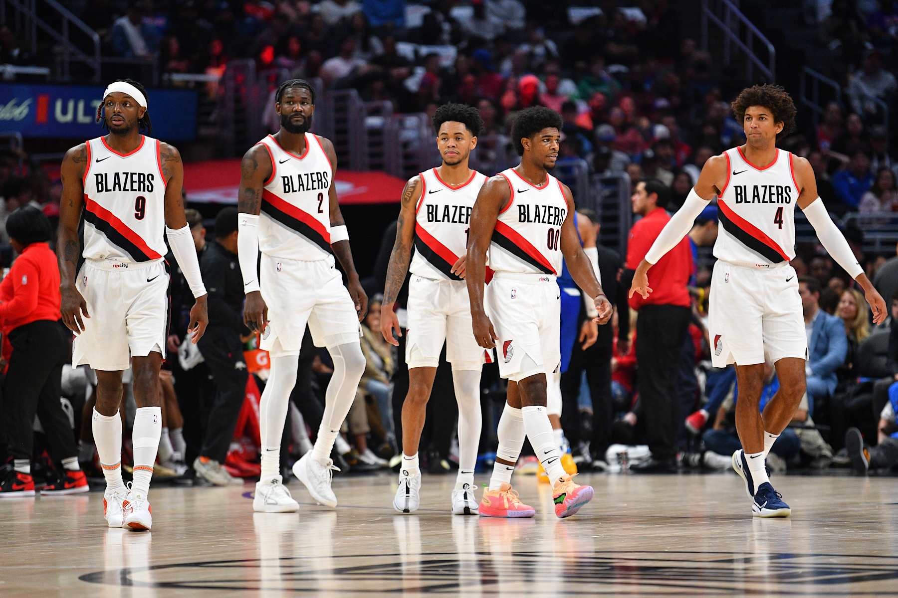 LOS ANGELES, CA - OCTOBER 25: Portland Trail Blazers forward Jerami Grant (9), Portland Trail Blazers center DeAndre Ayton (2), Portland Trail Blazers guard Anfernee Simons (1), Portland Trail Blazers guard Scoot Henderson (00) and Portland Trail Blazers forward Matisse Thybulle (4) look on during a NBA game between the Portland Trail Blazers and the Los Angeles Clippers on October 25, 2023 at Crypto.com Arena in Los Angeles, CA. (Photo by Brian Rothmuller/Icon Sportswire via Getty Images)