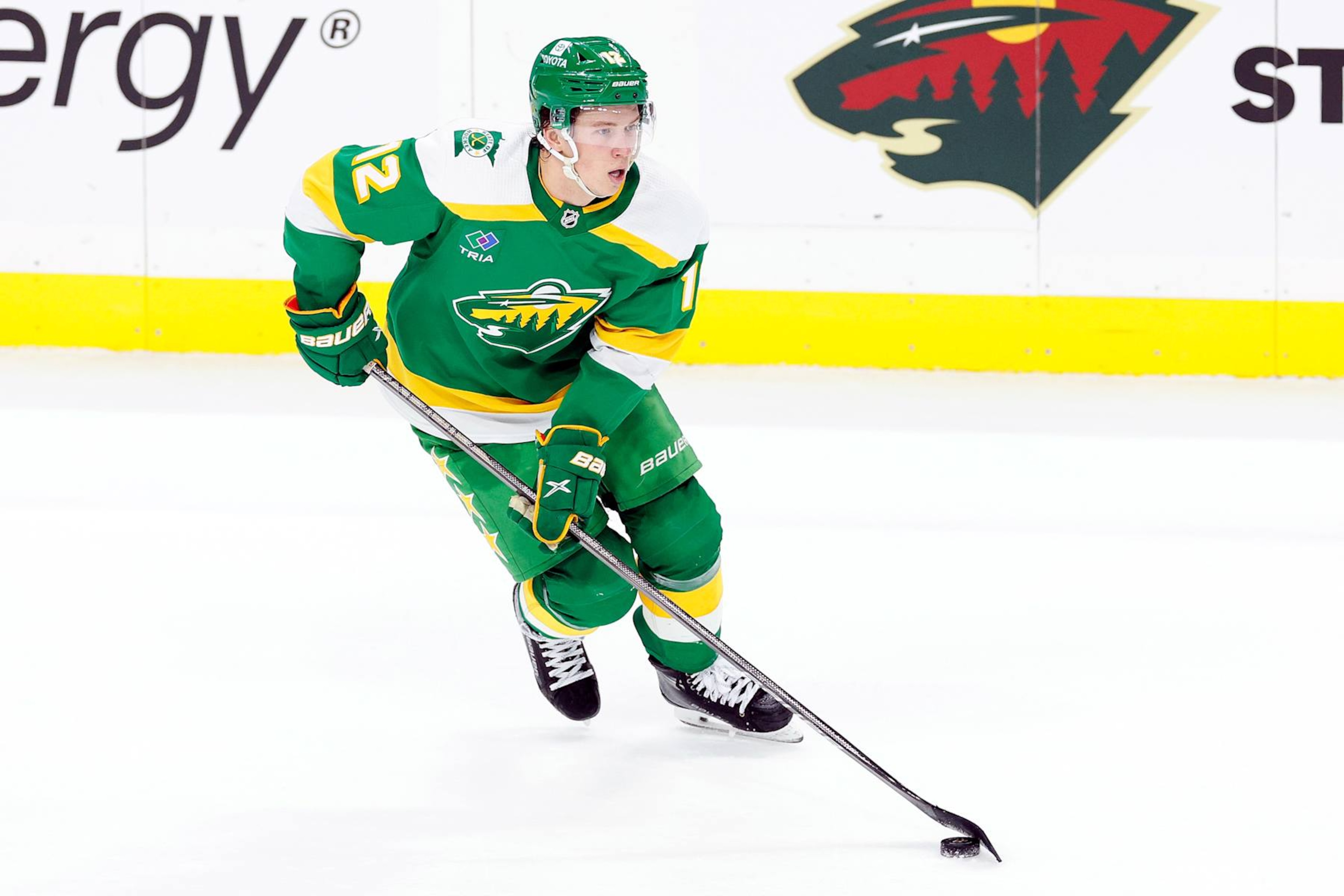 ST PAUL, MINNESOTA - MARCH 30: Matt Boldy #12 of the Minnesota Wild skates with the puck against the Vegas Golden Knights in the third period at Xcel Energy Center on March 30, 2024 in St Paul, Minnesota. The Golden Knights defeated the Wild 2-1 in overtime. (Photo by David Berding/Getty Images)