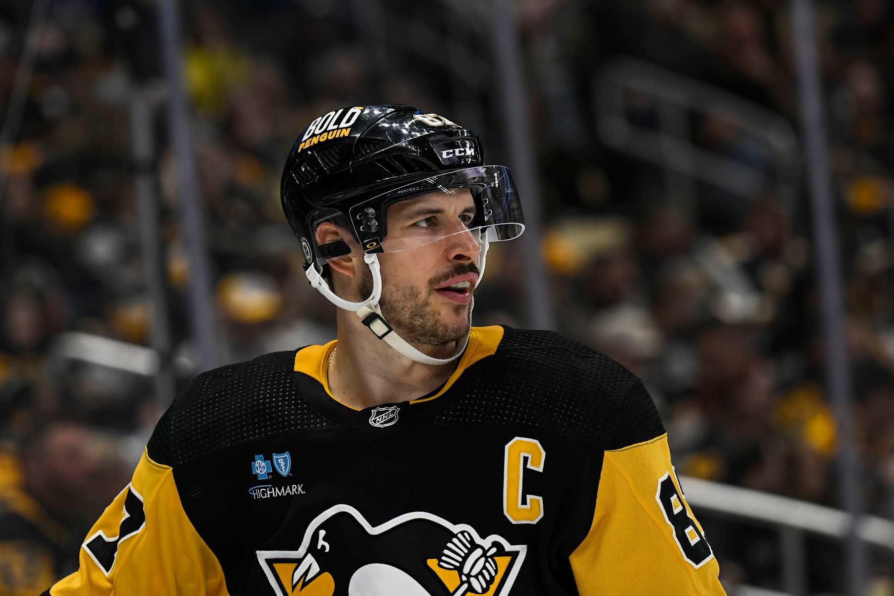 PITTSBURGH, PA - APRIL 13: Pittsburgh Penguins center Sidney Crosby (87) looks on during the third period in the NHL game between the Pittsburgh Penguins and the Boston Bruins on April 13, 2024, at PPG Paints Arena in Pittsburgh, PA. (Photo by Jeanine Leech/Icon Sportswire via Getty Images)
