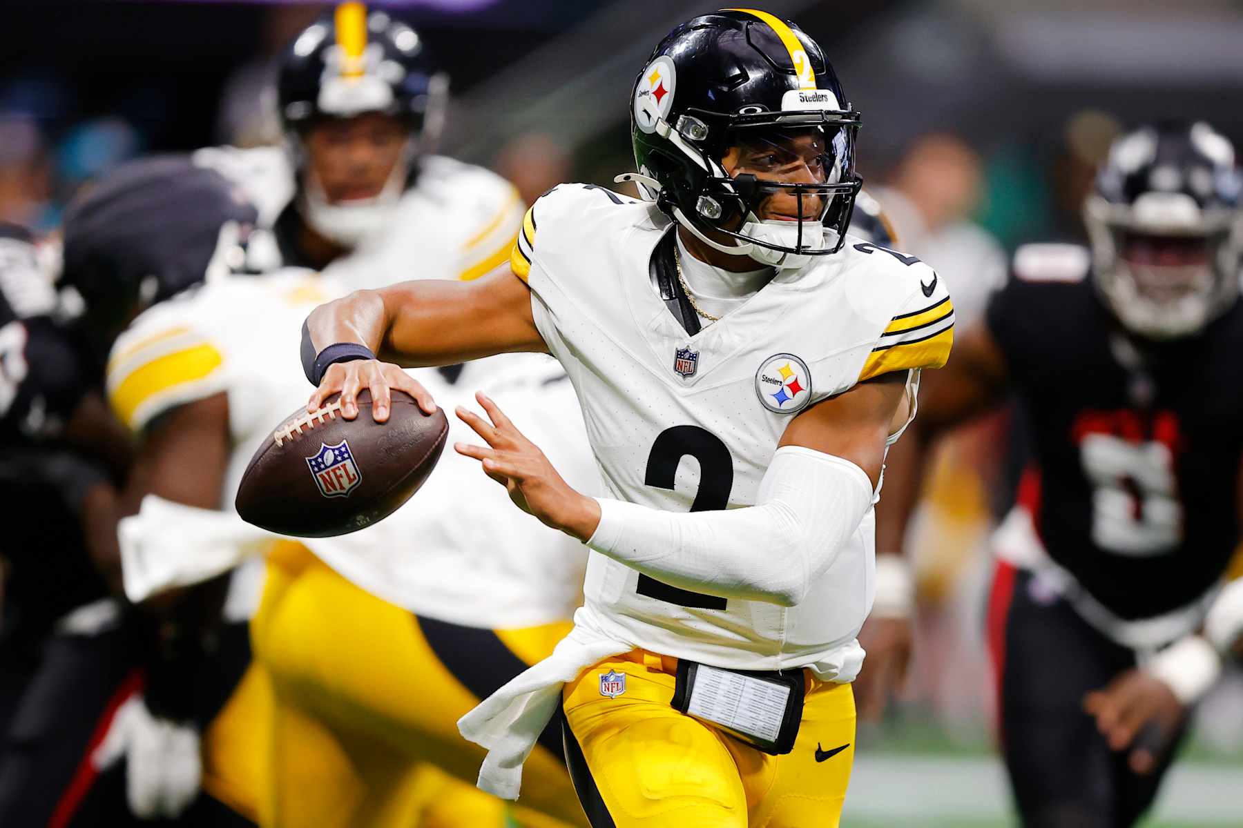 ATLANTA, GEORGIA - SEPTEMBER 08: Justin Fields #2 of the Pittsburgh Steelers attempts a pass during the first quarter against the Atlanta Falcons at Mercedes-Benz Stadium on September 08, 2024 in Atlanta, Georgia. (Photo by Todd Kirkland/Getty Images)
