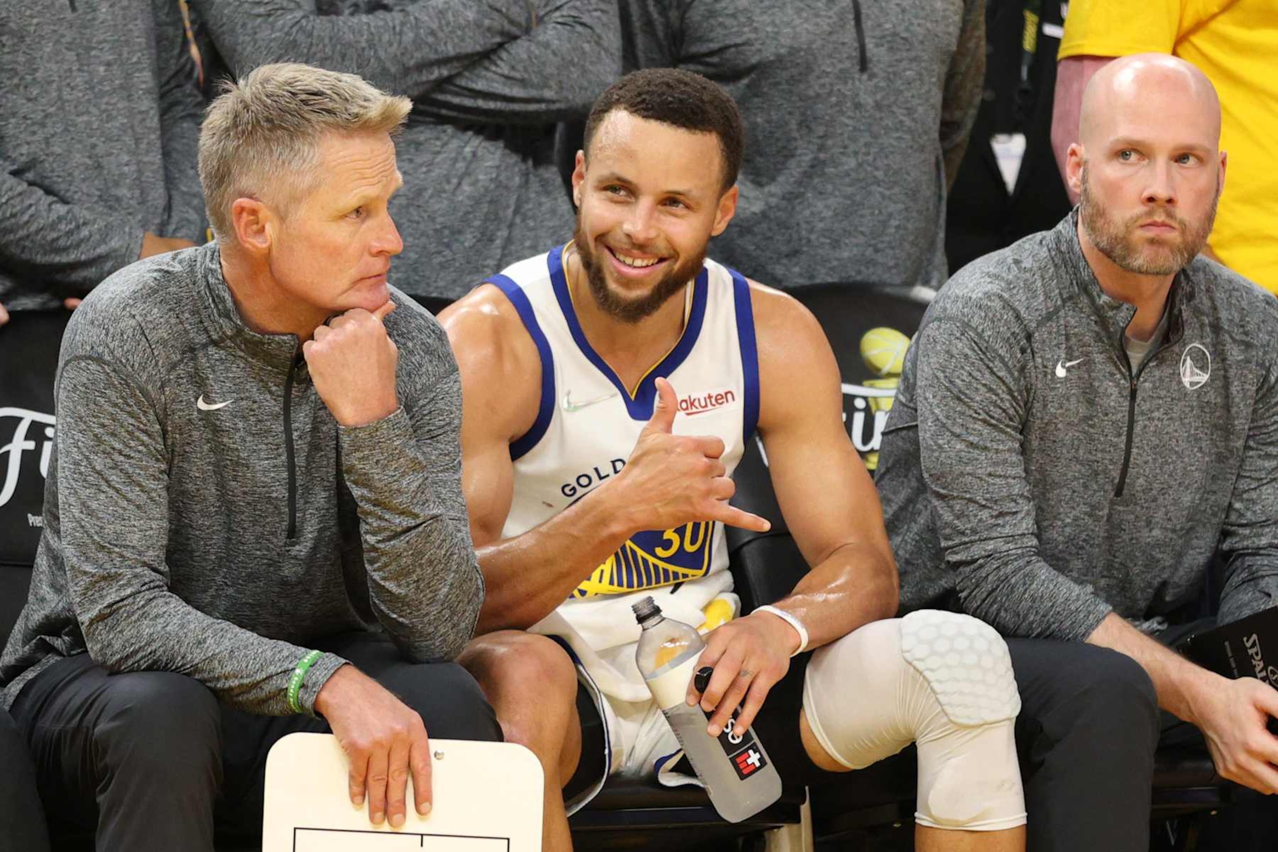 SAN FRANCISCO, CALIFORNIA - JUNE 13: Head coach Steve Kerr and Stephen Curry #30 of the Golden State Warriors looks on during the fourth quarter against the Boston Celtics in Game Five of the 2022 NBA Finals at Chase Center on June 13, 2022 in San Francisco, California. The Golden State Warriors won 104-94. NOTE TO USER: User expressly acknowledges and agrees that, by downloading and/or using this photograph, User is consenting to the terms and conditions of the Getty Images License Agreement. (Photo by Ezra Shaw/Getty Images) SAN FRANCISCO, CALIFORNIA - JUNE 13: Head coach Steve Kerr and Stephen Curry #30 of the Golden State Warriors looks on during the fourth quarter against the Boston Celtics in Game Five of the 2022 NBA Finals at Chase Center on June 13, 2022 in San Francisco, California. The Golden State Warriors won 104-94. NOTE TO USER: User expressly acknowledges and agrees that, by downloading and/or using this photograph, User is consenting to the terms and conditions of the Getty Images License Agreement. (Photo by Ezra Shaw/Getty Images)