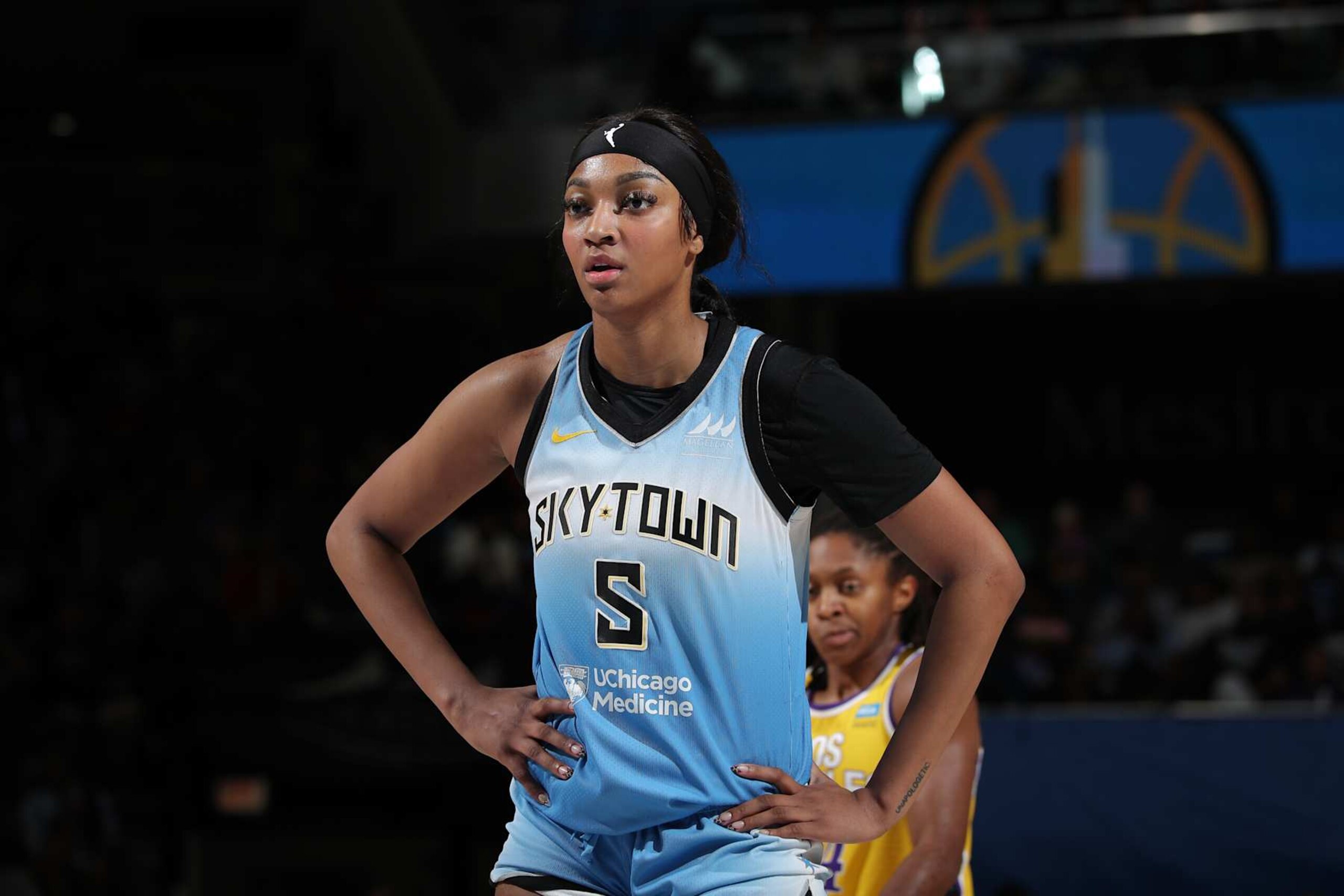 CHICAGO, IL - SEPTEMBER 6: Angel Reese #5 of the Chicago Sky looks on during the game against the Los Angeles Sparks on September 6, 2024 at the Wintrust Arena in Chicago, IL. NOTE TO USER: User expressly acknowledges and agrees that, by downloading and or using this photograph, User is consenting to the terms and conditions of the Getty Images License Agreement. Mandatory Copyright Notice: Copyright 2024 NBAE (Photo by Gary Dineen/NBAE via Getty Images) CHICAGO, IL - SEPTEMBER 6: Angel Reese #5 of the Chicago Sky looks on during the game against the Los Angeles Sparks on September 6, 2024 at the Wintrust Arena in Chicago, IL. NOTE TO USER: User expressly acknowledges and agrees that, by downloading and or using this photograph, User is consenting to the terms and conditions of the Getty Images License Agreement. Mandatory Copyright Notice: Copyright 2024 NBAE (Photo by Gary Dineen/NBAE via Getty Images)