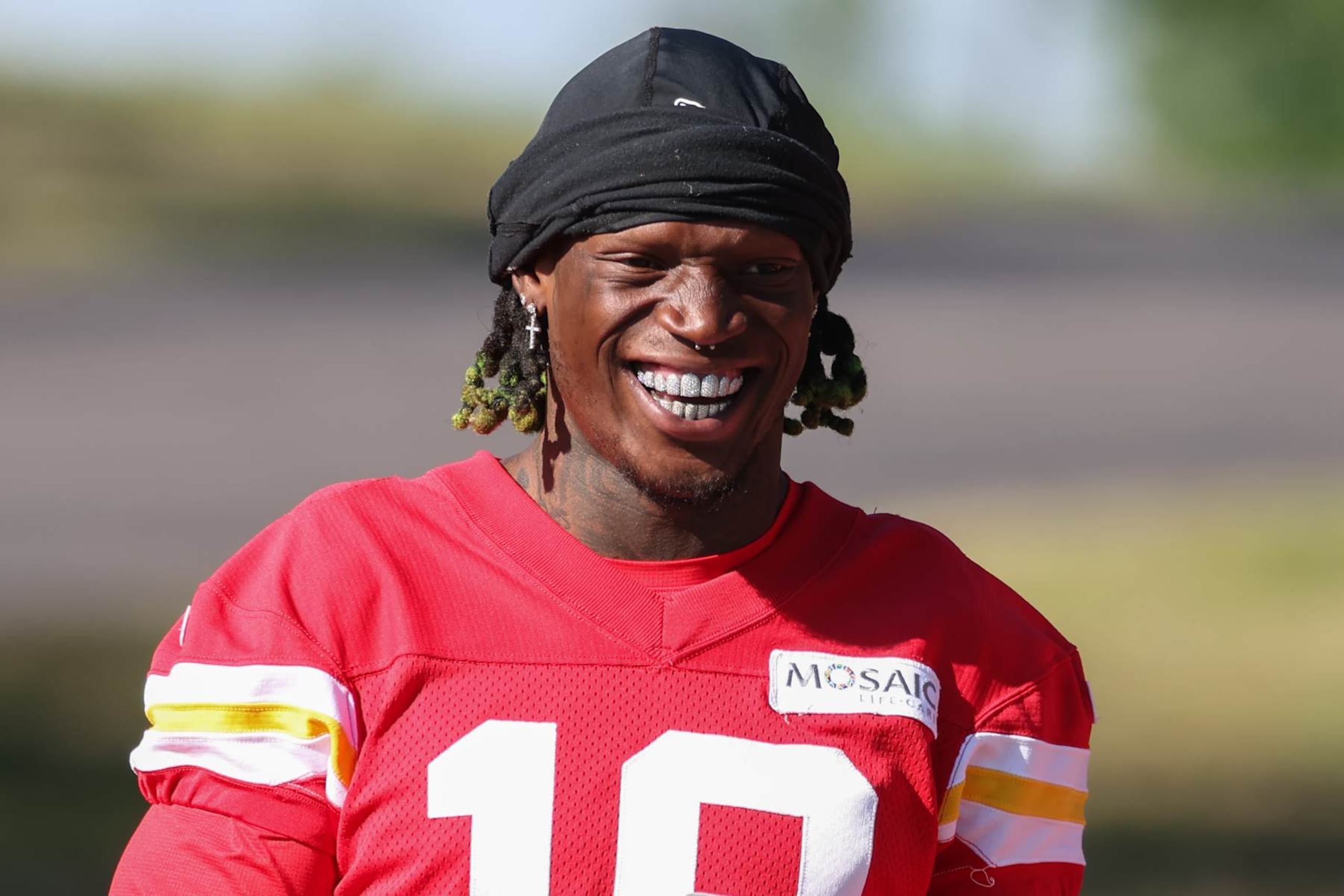 ST. JOSEPH, MO - AUGUST 02: Kansas City Chiefs wide receiver Kadarius Toney (19) smiles and shows off his teeth during training camp on August 2, 2024 at Missouri Western State University in St. Joseph, MO. (Photo by Scott Winters/Icon Sportswire via Getty Images)