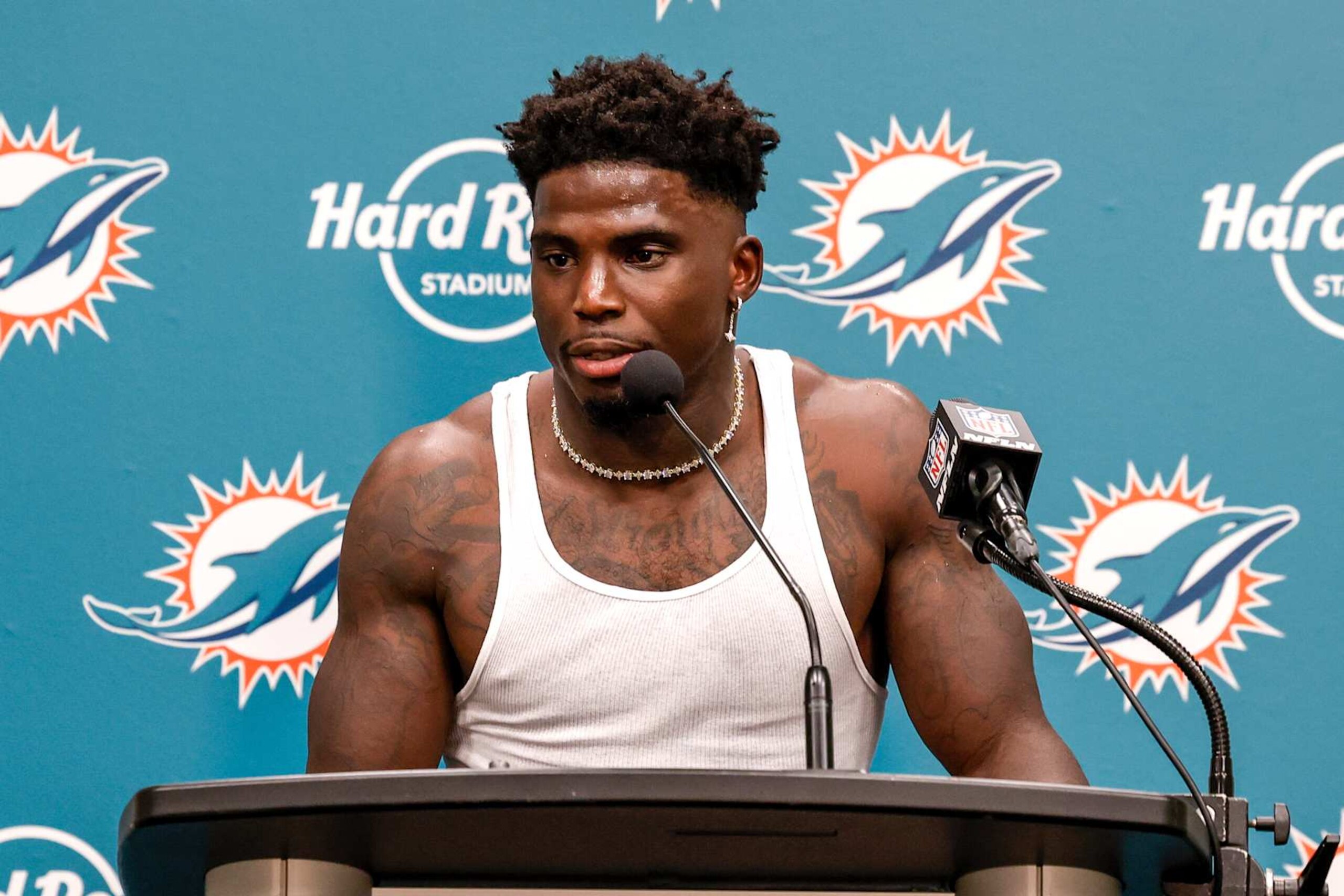 MIAMI GARDENS, FL - SEPTEMBER 8: Wide Receiver Tyreek Hill #10 of the Miami Dolphins addresses the media during the post-game press conference after playing the Jacksonville Jaguars at Hard Rock Stadium on September 8, 2024 in Miami Gardens, Florida. Hill was handcuffed and placed facedown on a street by police officers after he was stopped for a traffic violation near Hard Rock Stadium just hours before his team was to open the 2024 football season. The Dolphins defeated the Jaguars 20-17. (Photo by Don Juan Moore/Getty Images)