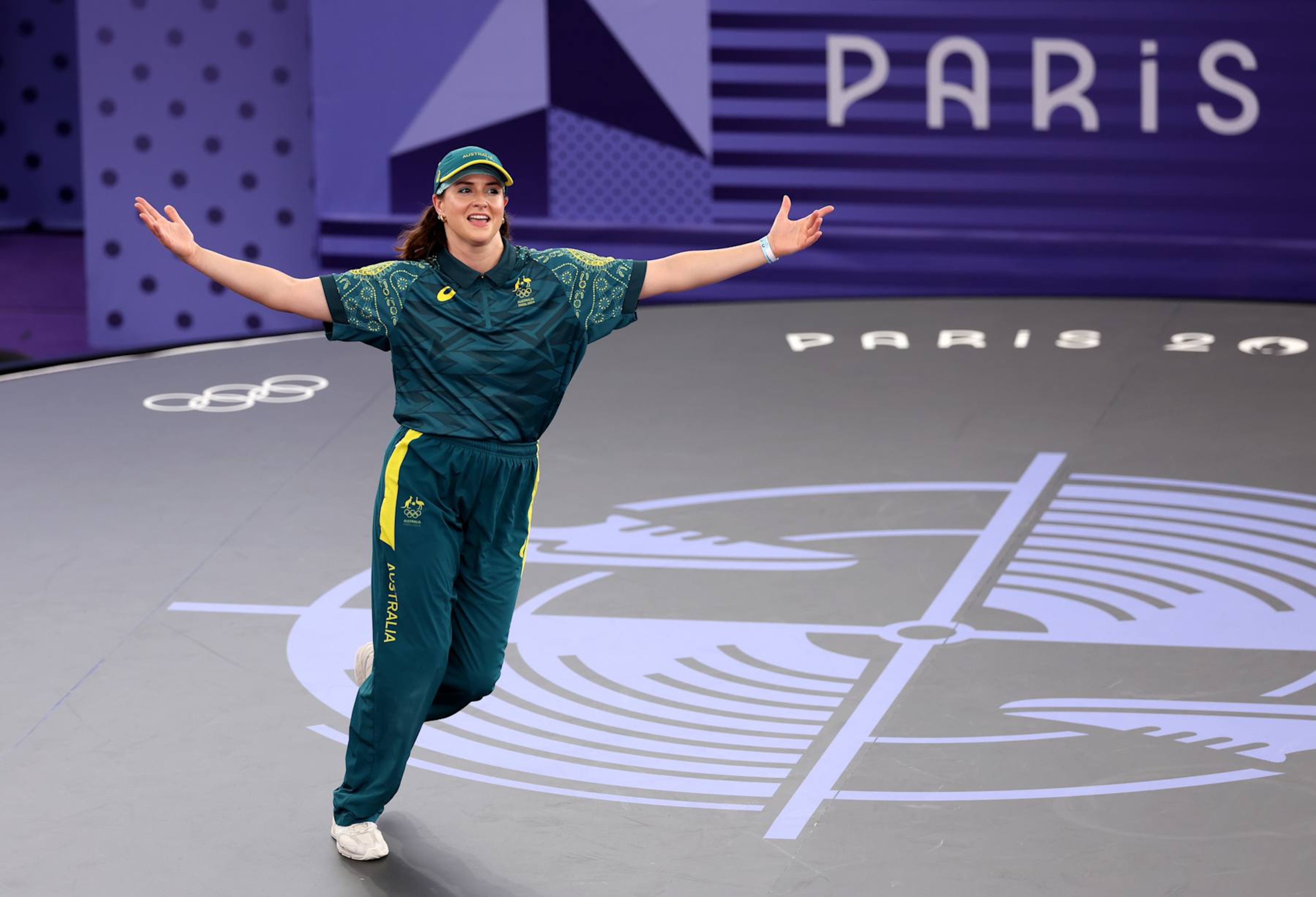 PARIS, FRANCE - AUGUST 09: B-Girl Raygun of Team Australia reacts during the B-Girls Round Robin - Group B on day fourteen of the Olympic Games Paris 2024 at Place de la Concorde on August 09, 2024 in Paris, France. (Photo by Ezra Shaw/Getty Images)