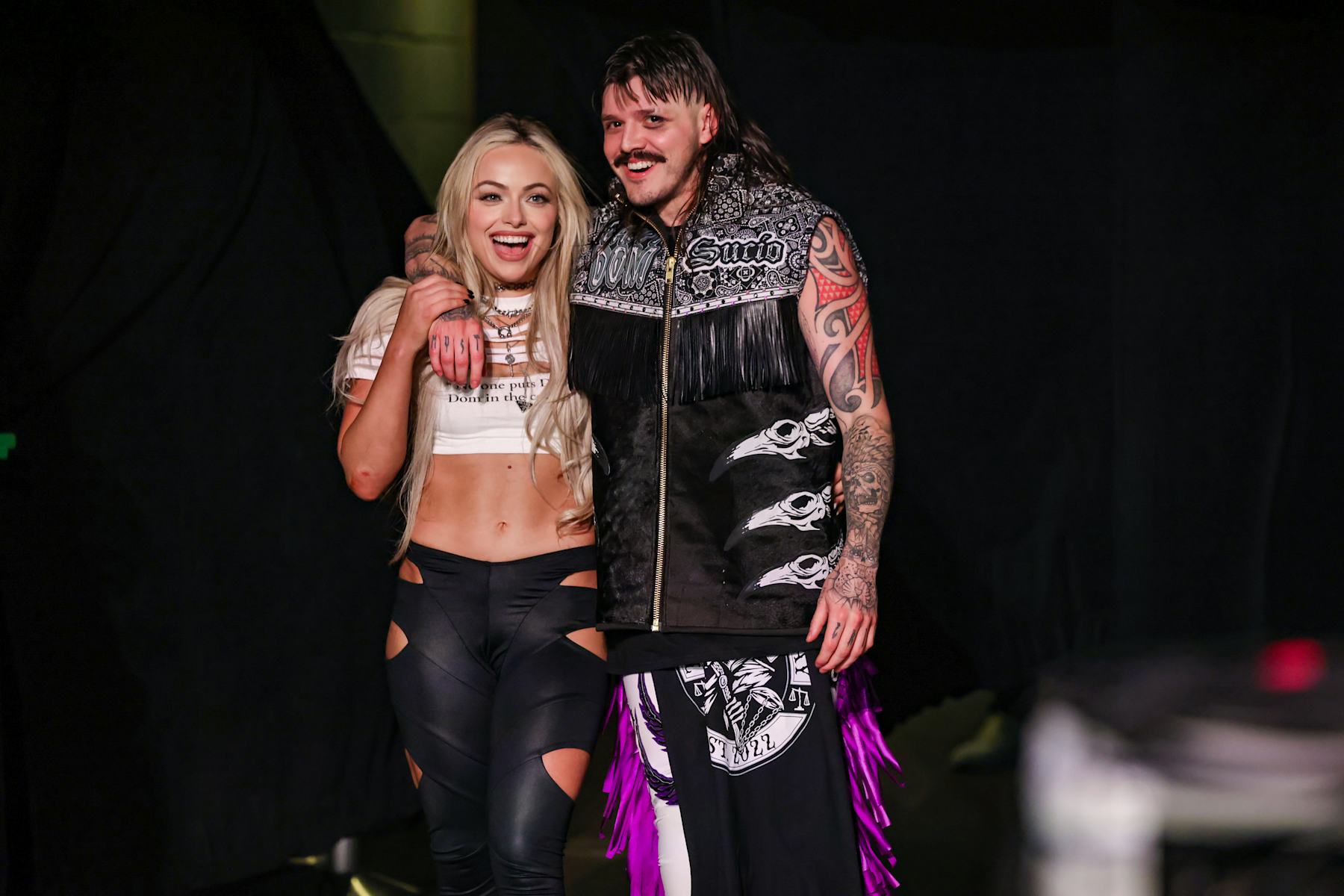 DENVER, COLORADO - SEPTEMBER 2: Liv Morgan and "Dirty" Dominik Mysterio look on during Monday Night RAW at Ball Arena on September 2, 2024 in Denver, Colorado.  (Photo by WWE/Getty Images)