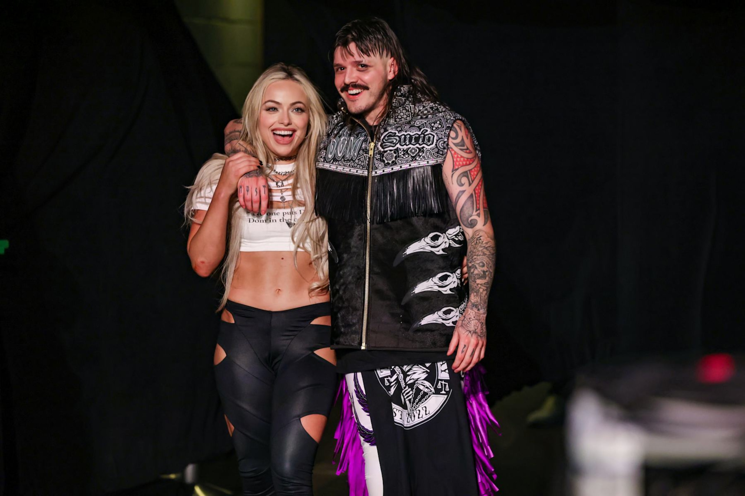 DENVER, COLORADO - SEPTEMBER 2: Liv Morgan and "Dirty" Dominik Mysterio look on during Monday Night RAW at Ball Arena on September 2, 2024 in Denver, Colorado. (Photo by WWE/Getty Images) DENVER, COLORADO - SEPTEMBER 2: Liv Morgan and "Dirty" Dominik Mysterio look on during Monday Night RAW at Ball Arena on September 2, 2024 in Denver, Colorado. (Photo by WWE/Getty Images)