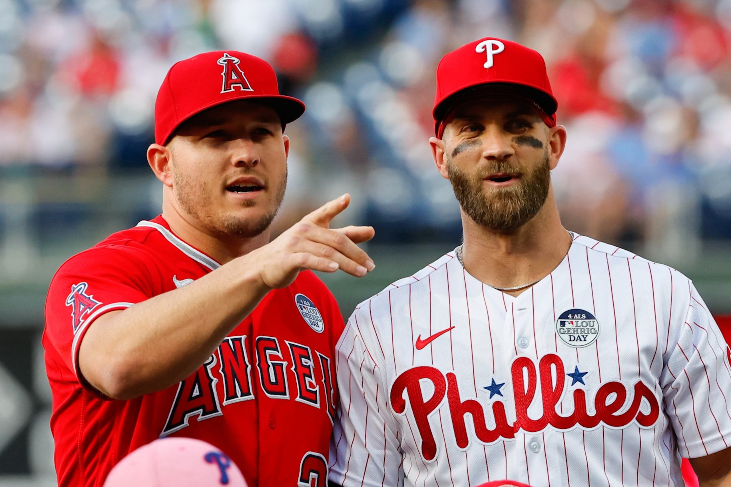 PHILADELPHIA, PA - JUNE 03:  Los Angeles Angels center fielder Mike Trout (27) and Philadelphia Phillies designated hitter Bryce Harper (3) pose for photos on the field prior to the Major League Baseball game between the Philadelphia Phillies and the Los Angeles Angels on June 3, 2022 at Citizens Bank Park in Philadelphia, Pennsylvania.   (Photo by Rich Graessle/Icon Sportswire via Getty Images)