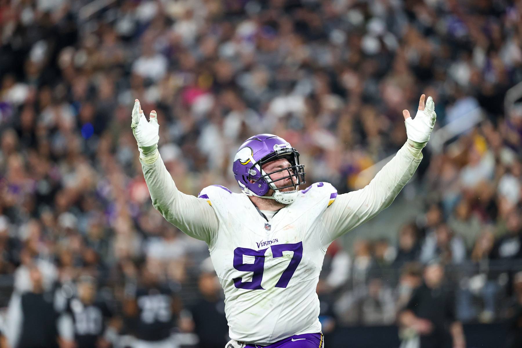 LAS VEGAS, NEVADA - DECEMBER 10: Harrison Phillips #97 of the Minnesota Vikings celebrates after a sack during the fourth quarter against the Las Vegas Raiders at Allegiant Stadium on December 10, 2023 in Las Vegas, Nevada. (Photo by Ian Maule/Getty Images)