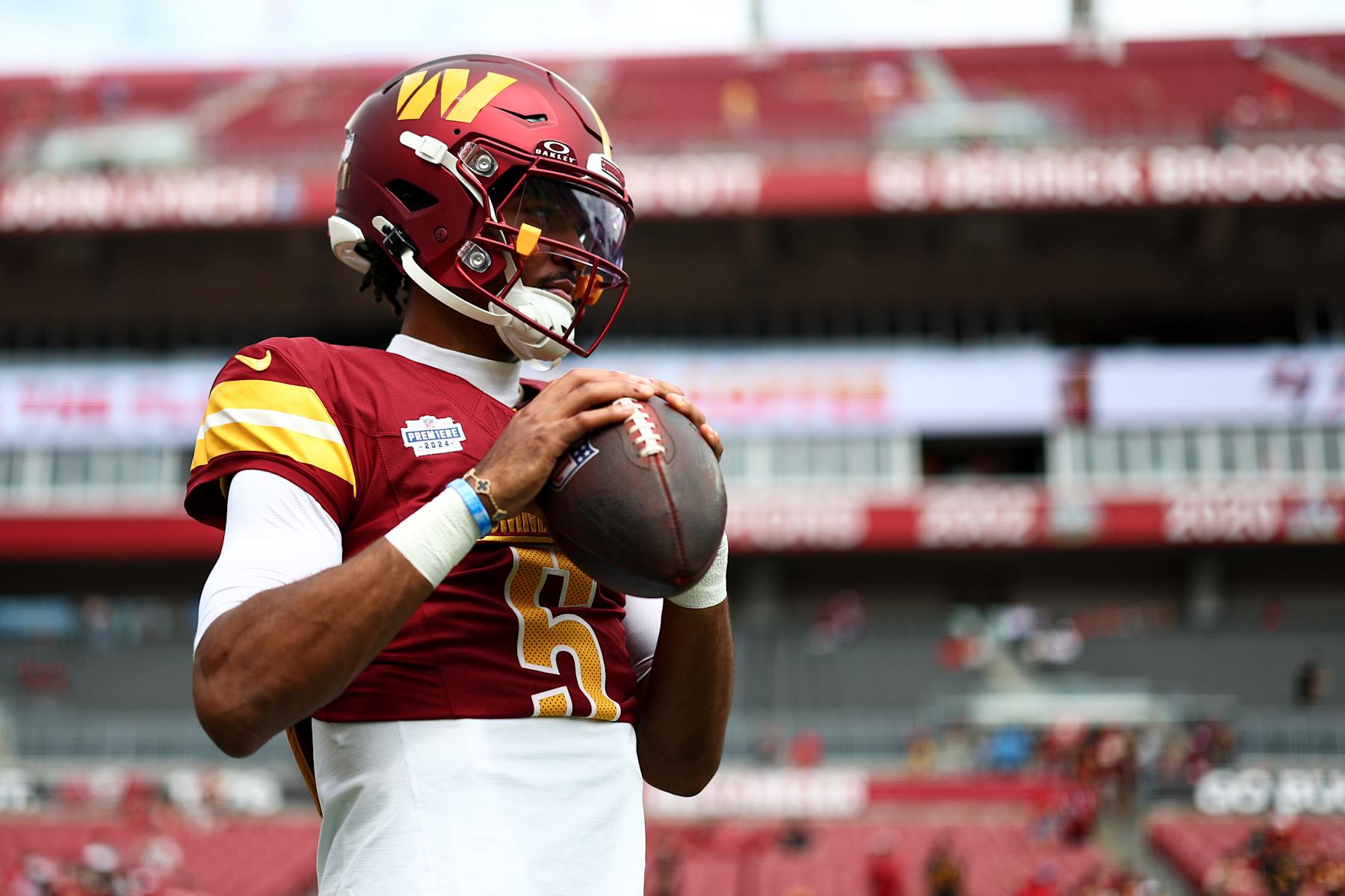 TAMPA, FL - SEPTEMBER 8: Jayden Daniels #5 of the Washington Commanders warms up prior to an NFL football game against the Tampa Bay Buccaneers at Raymond James Stadium on September 8, 2024 in Tampa, Florida. (Photo by Kevin Sabitus/Getty Images)