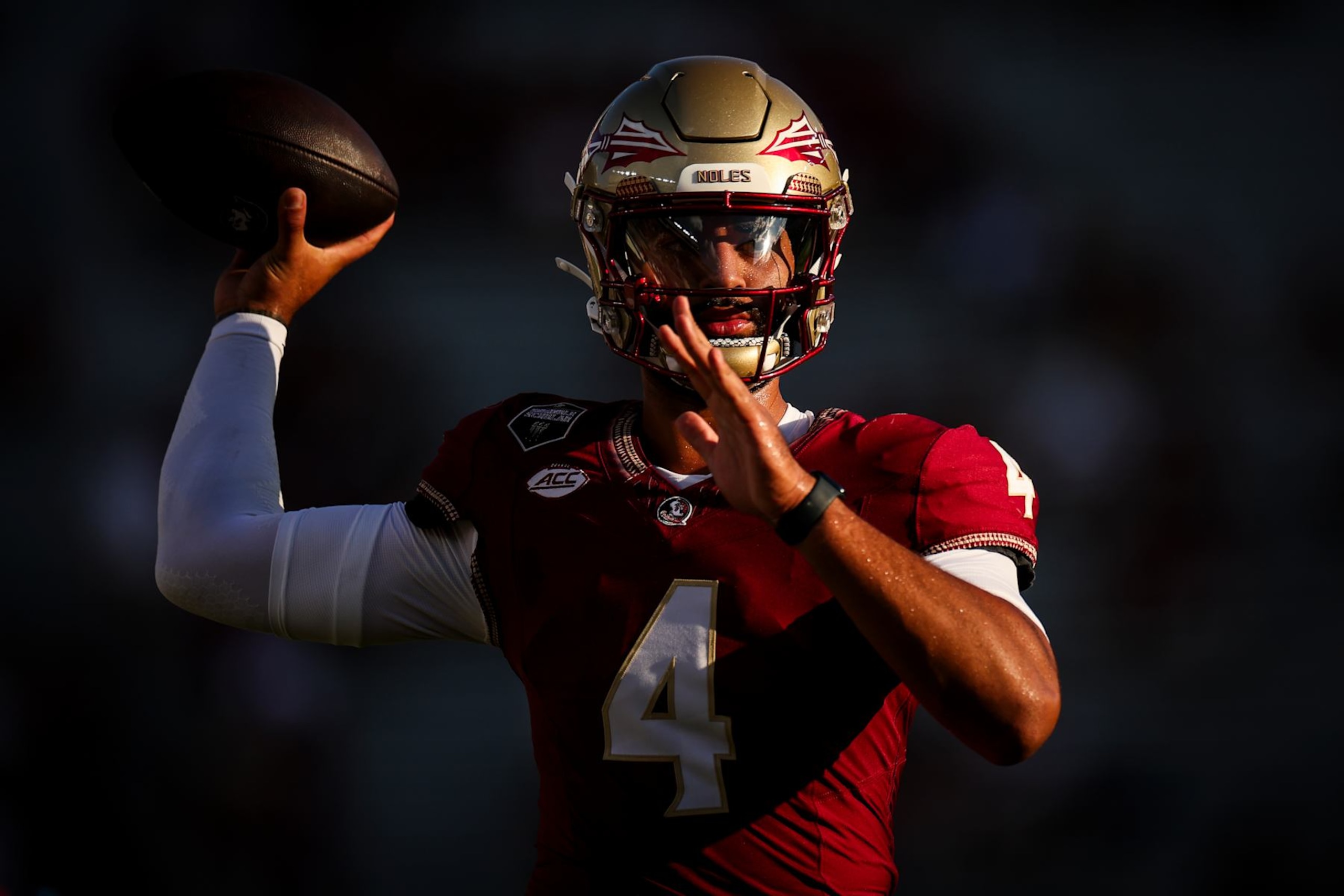 TALLAHASSEE, FLORIDA - SEPTEMBER 02: DJ Uiagalelei #4 of the Florida State Seminoles warms up before the start of a game against the Boston College Eagles at Doak Campbell Stadium on September 02, 2024 in Tallahassee, Florida. (Photo by James Gilbert/Getty Images) TALLAHASSEE, FLORIDA - SEPTEMBER 02: DJ Uiagalelei #4 of the Florida State Seminoles warms up before the start of a game against the Boston College Eagles at Doak Campbell Stadium on September 02, 2024 in Tallahassee, Florida. (Photo by James Gilbert/Getty Images)
