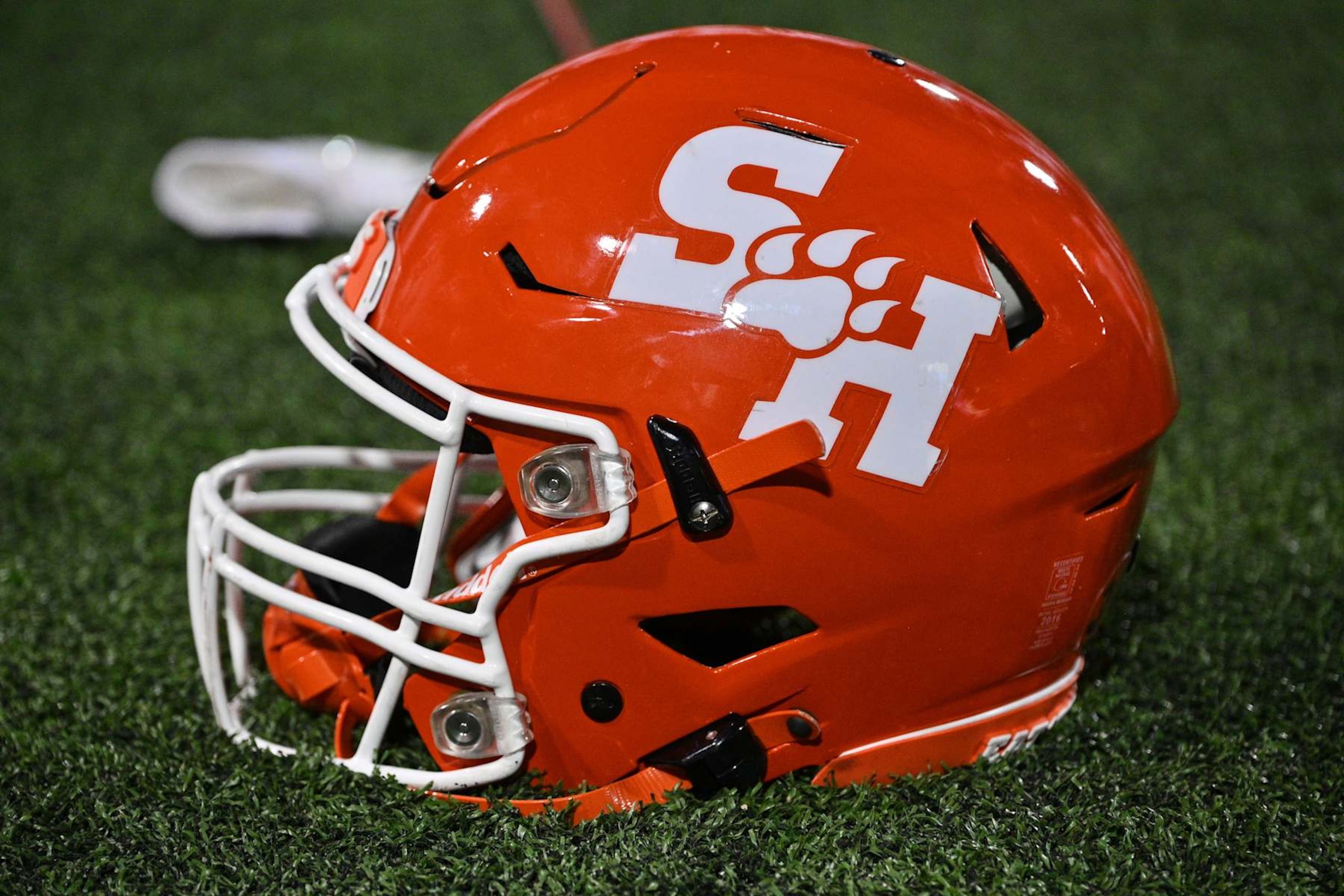 LAS CRUCES, NEW MEXICO - OCTOBER 11: A Sam Houston Bearkats helmet is placed on the sideline during the second half of a game between the Bearkats and the New Mexico State Aggies at Aggie Memorial Stadium on October 11, 2023 in Las Cruces, New Mexico. The Aggies defeated the Bearkats 27-13. (Photo by Sam Wasson/Getty Images) LAS CRUCES, NEW MEXICO - OCTOBER 11: A Sam Houston Bearkats helmet is placed on the sideline during the second half of a game between the Bearkats and the New Mexico State Aggies at Aggie Memorial Stadium on October 11, 2023 in Las Cruces, New Mexico. The Aggies defeated the Bearkats 27-13. (Photo by Sam Wasson/Getty Images)