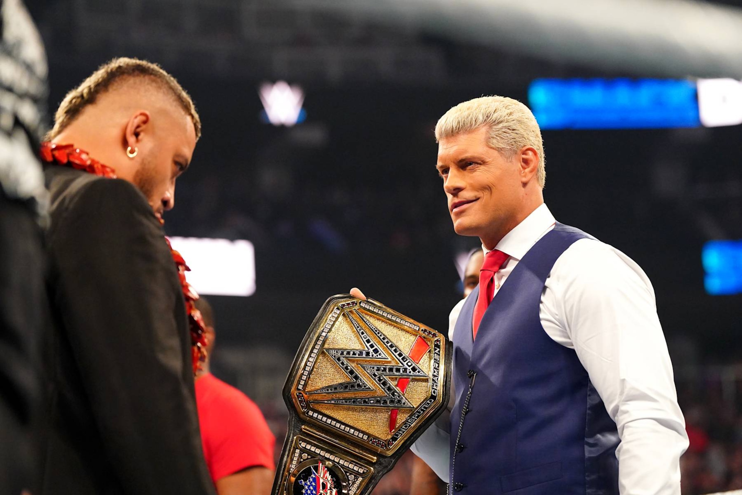 EDMONTON, CANADA - SEPTEMBER 6: WWE Undisputed Universal Champion Cody Rhodes (R) faces off with Solo SIkoa during WWE Friday Night SmackDown at Rogers Place on September 6, 2024 in Edmonton, Canada.  (Photo by WWE/Getty Images)